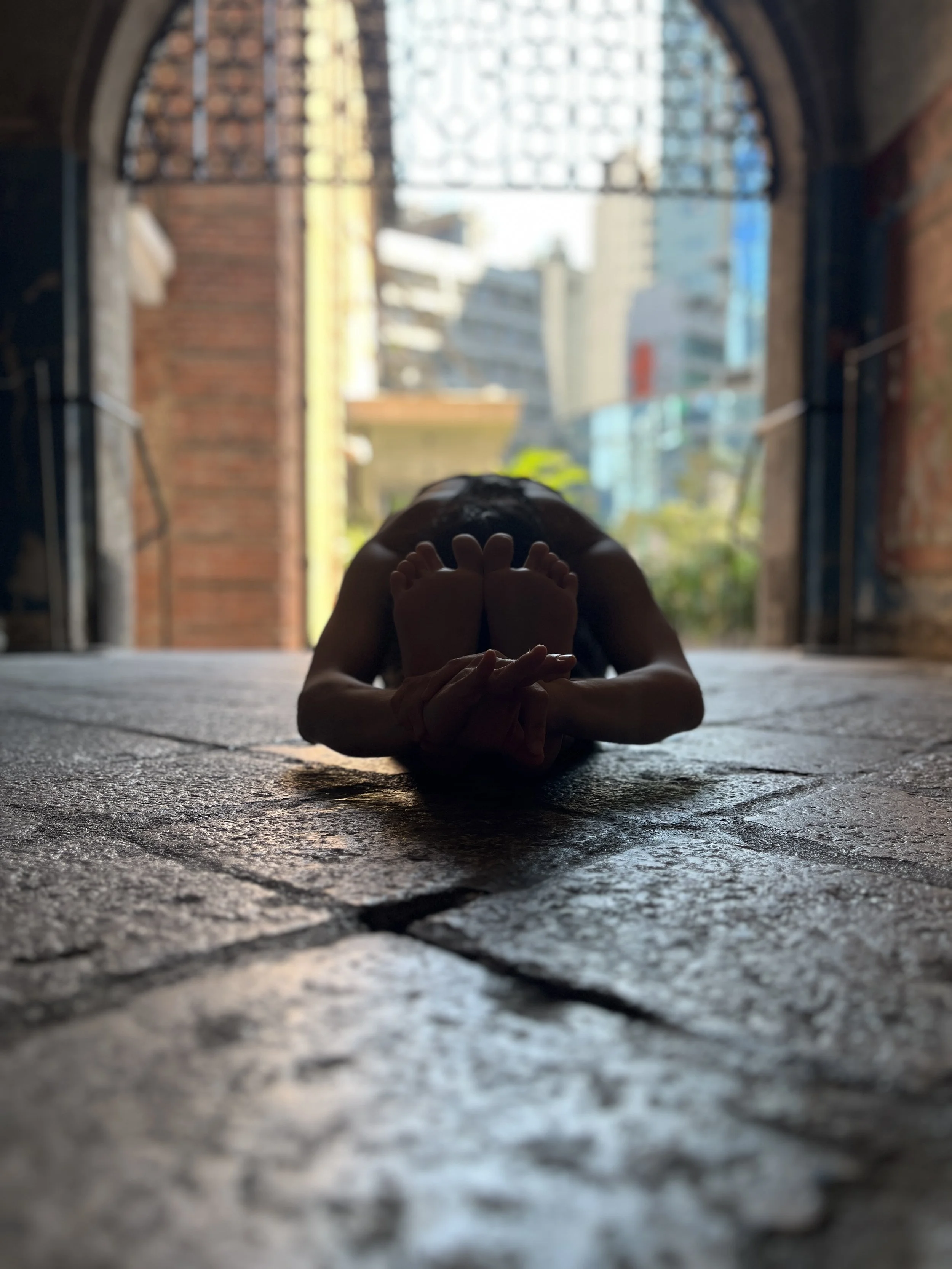 Asana, breath, drishti - tristhana. Pascimottanasana - forward fold, back opening. Vulnerability, security, dark, light, focus, surrender, peace. Ashtanga yoga method.