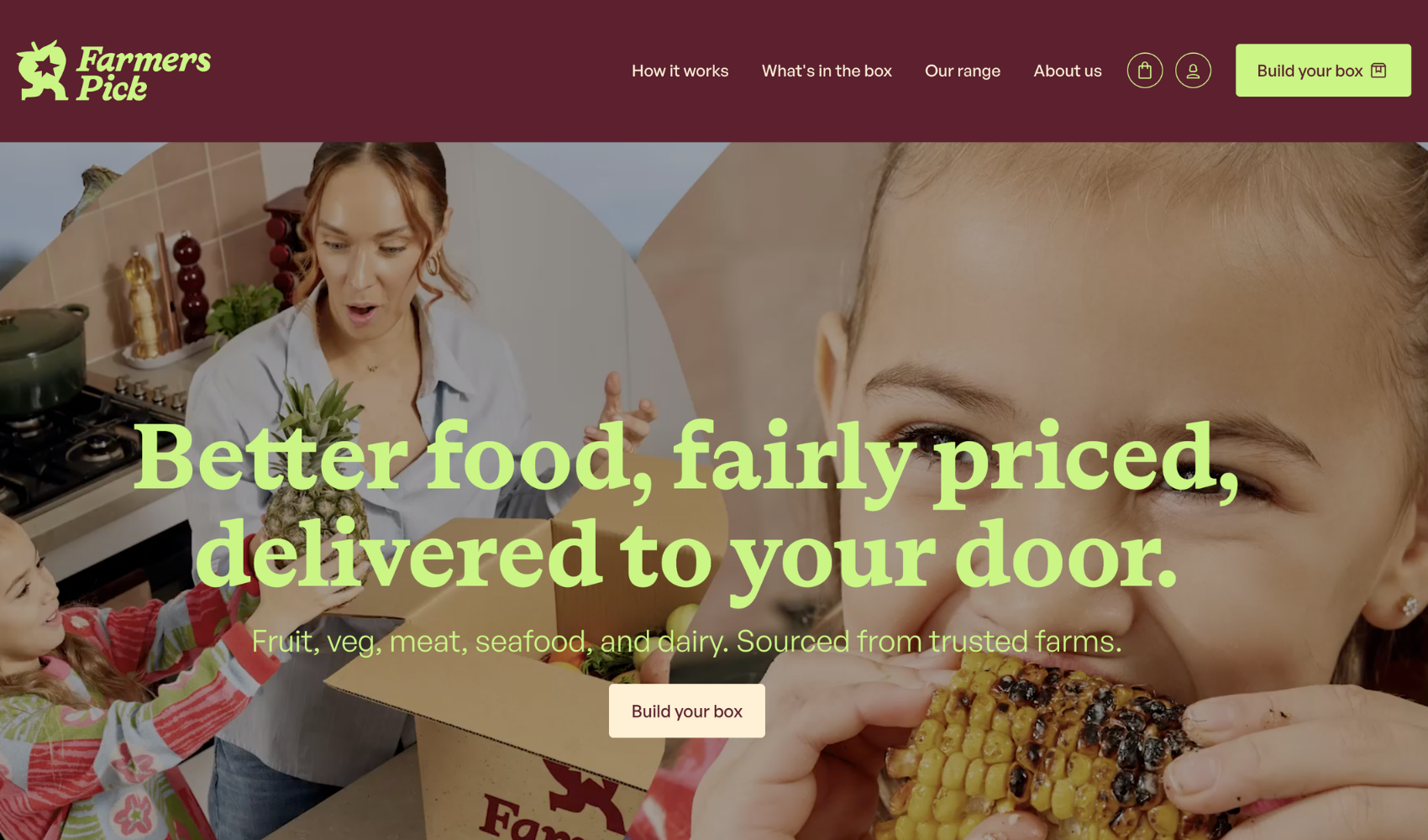 A woman and two children in a kitchen, with a box of food, promoting farm-fresh produce and deliveries to homes.