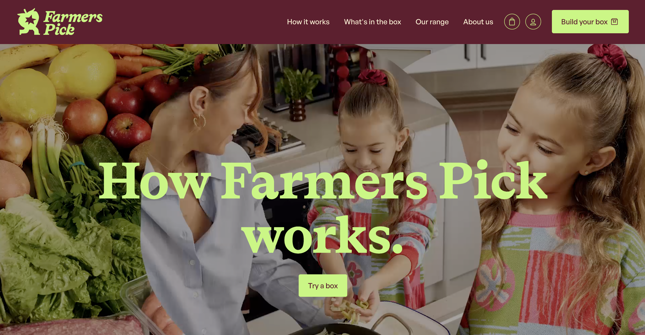 A family in a kitchen surrounded by fresh vegetables, with the text "How Farmers Pick works" overlaid and a button labeled "Try a box."