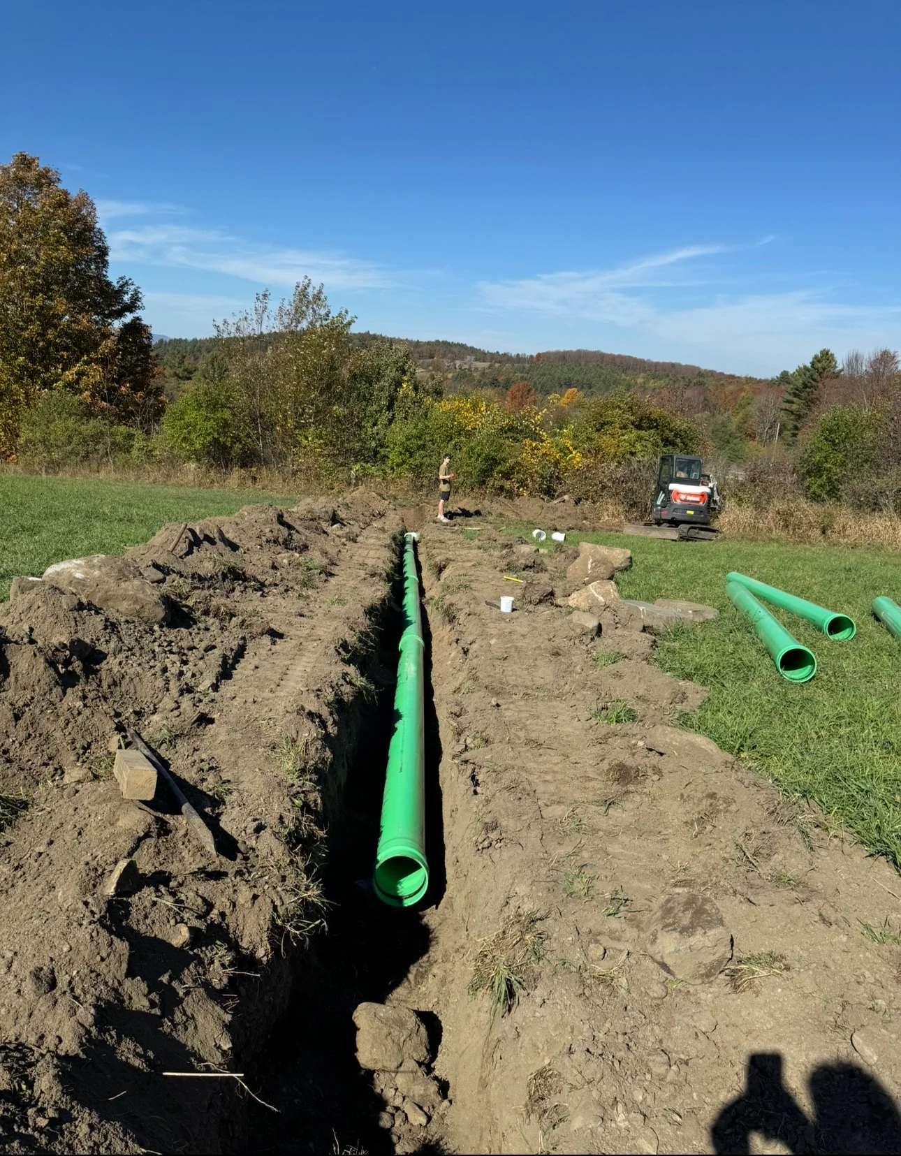 Installing 10 inch Drain Pipe for a new pond dig