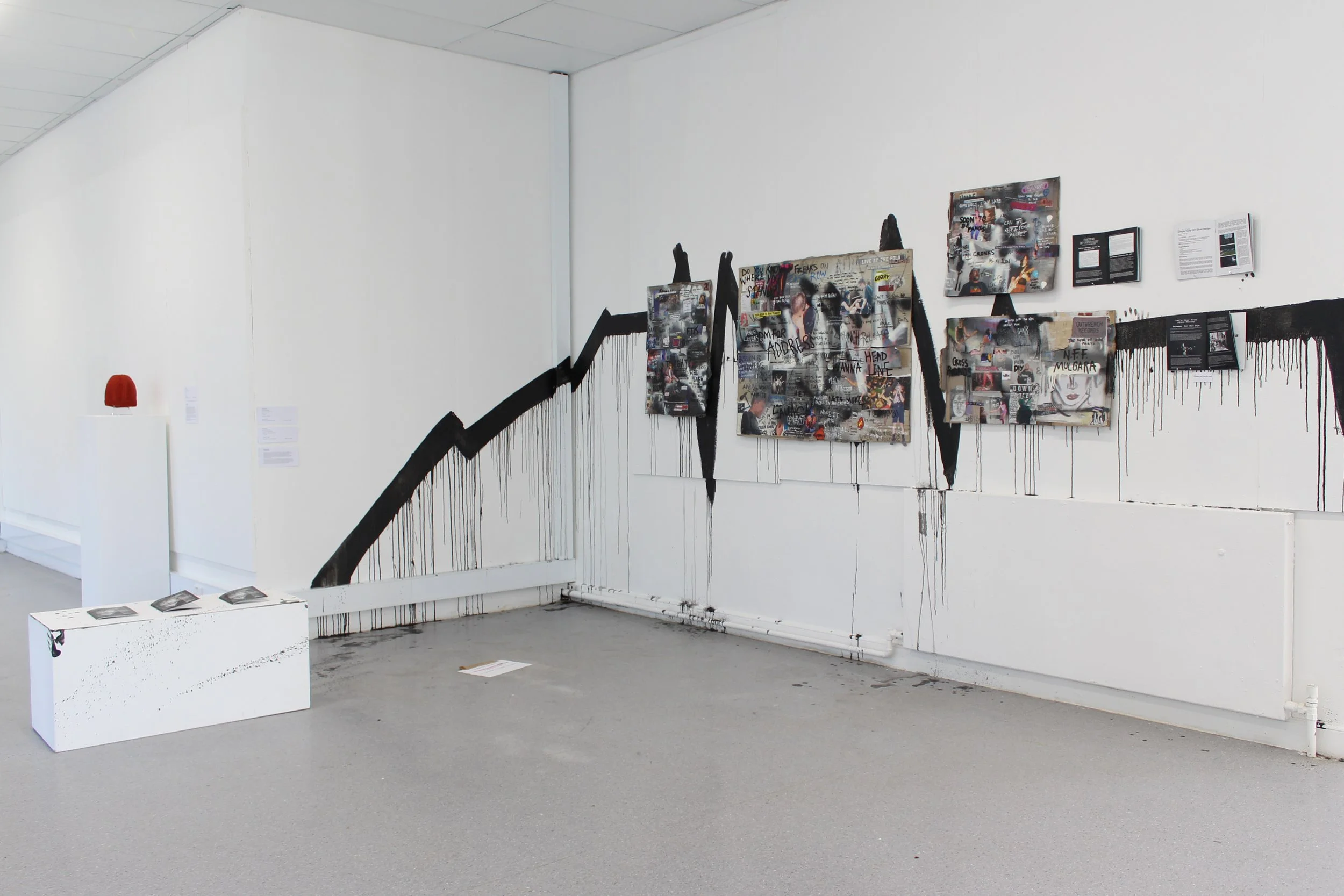 Installation on the classroom wall of the ANU School of Art & Design, 30 Nov - 8 Dec 2024. Mixed media collage on found cardboard, 100 x 150 cm. Photograph by Claire Fletcher.