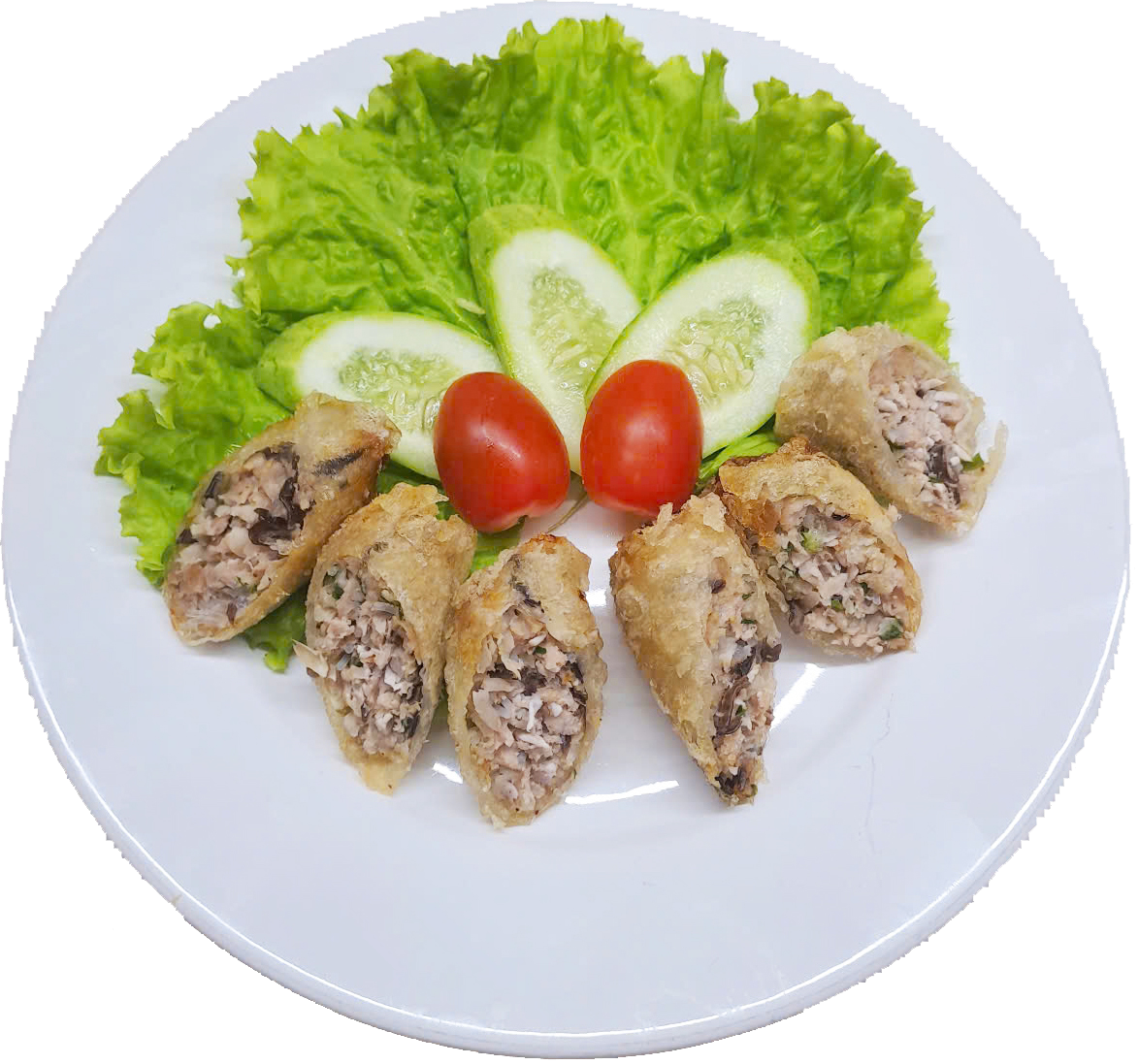 Fried stuffed egg rolls sliced in half, arranged in a circle on a white plate with lettuce, cucumber slices, and cherry tomatoes.