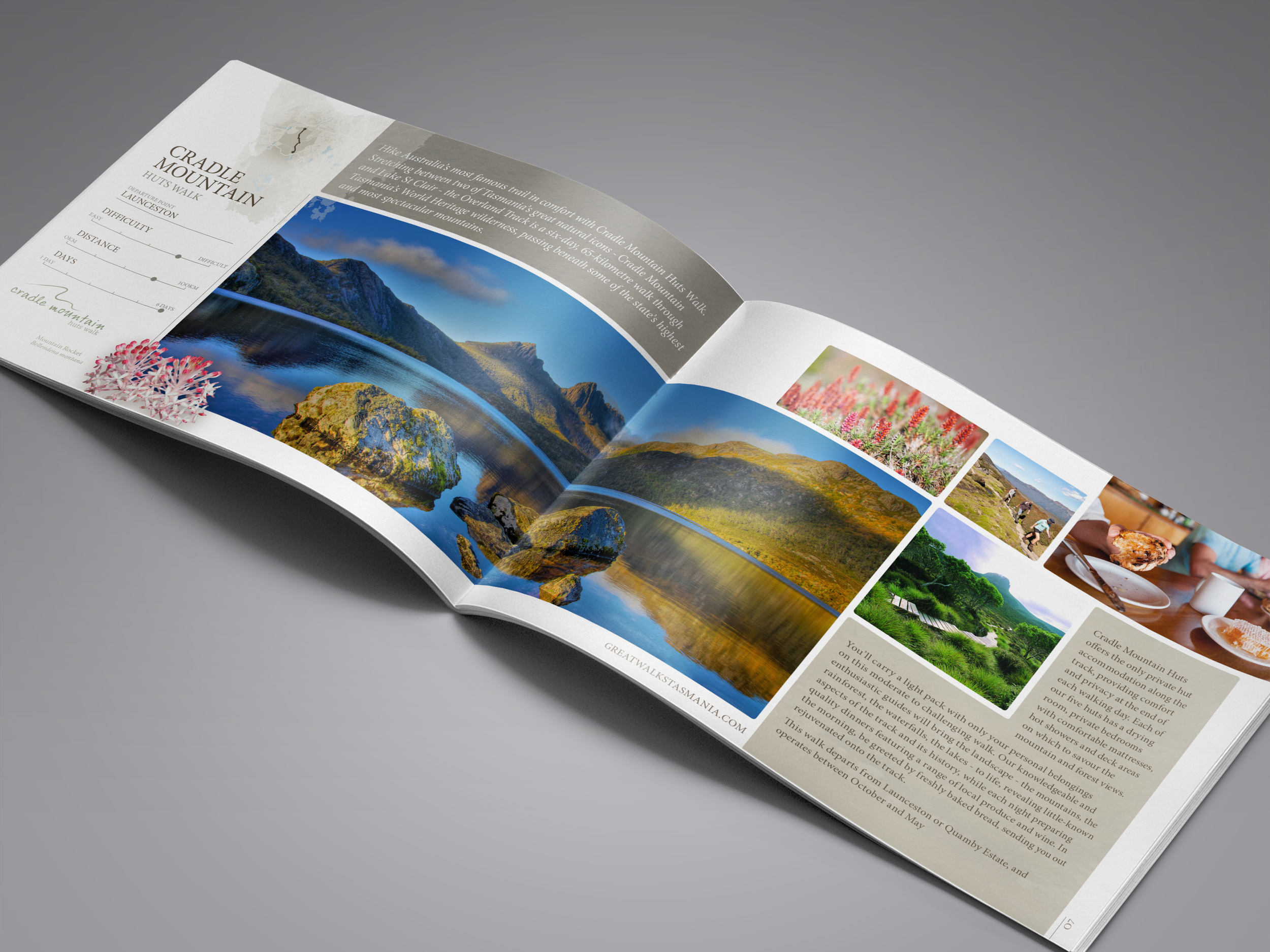 Open travel brochure featuring scenic photography of Cradle Mountain, Tasmania, with images of mountains, lakes, and nature, along with text descriptions and smaller pictures of wildflowers and food.