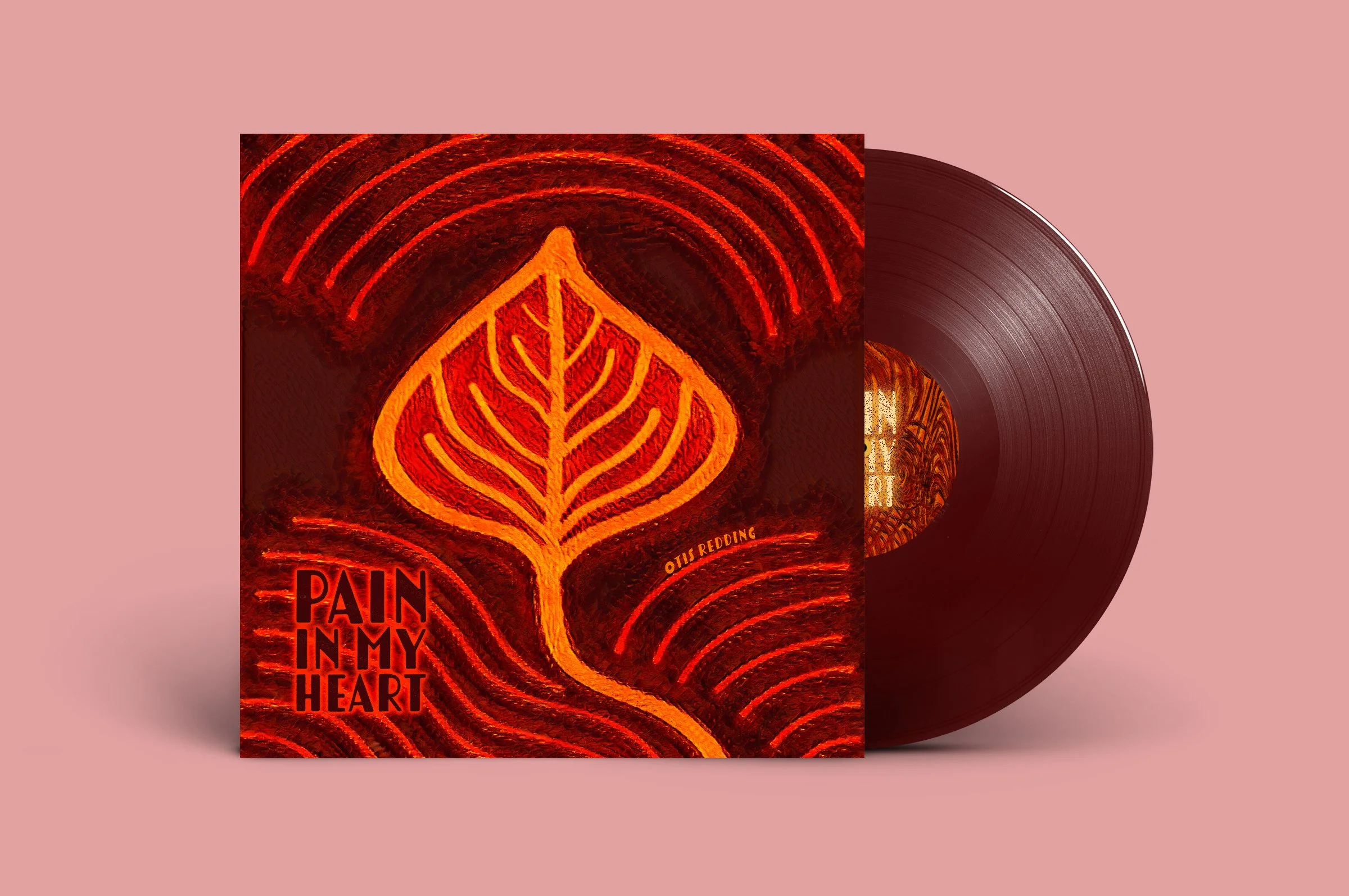 Vinyl record with album cover titled "Pain in My Heart" by Otis Redding featuring a red and orange abstract leaf design on a pink background.