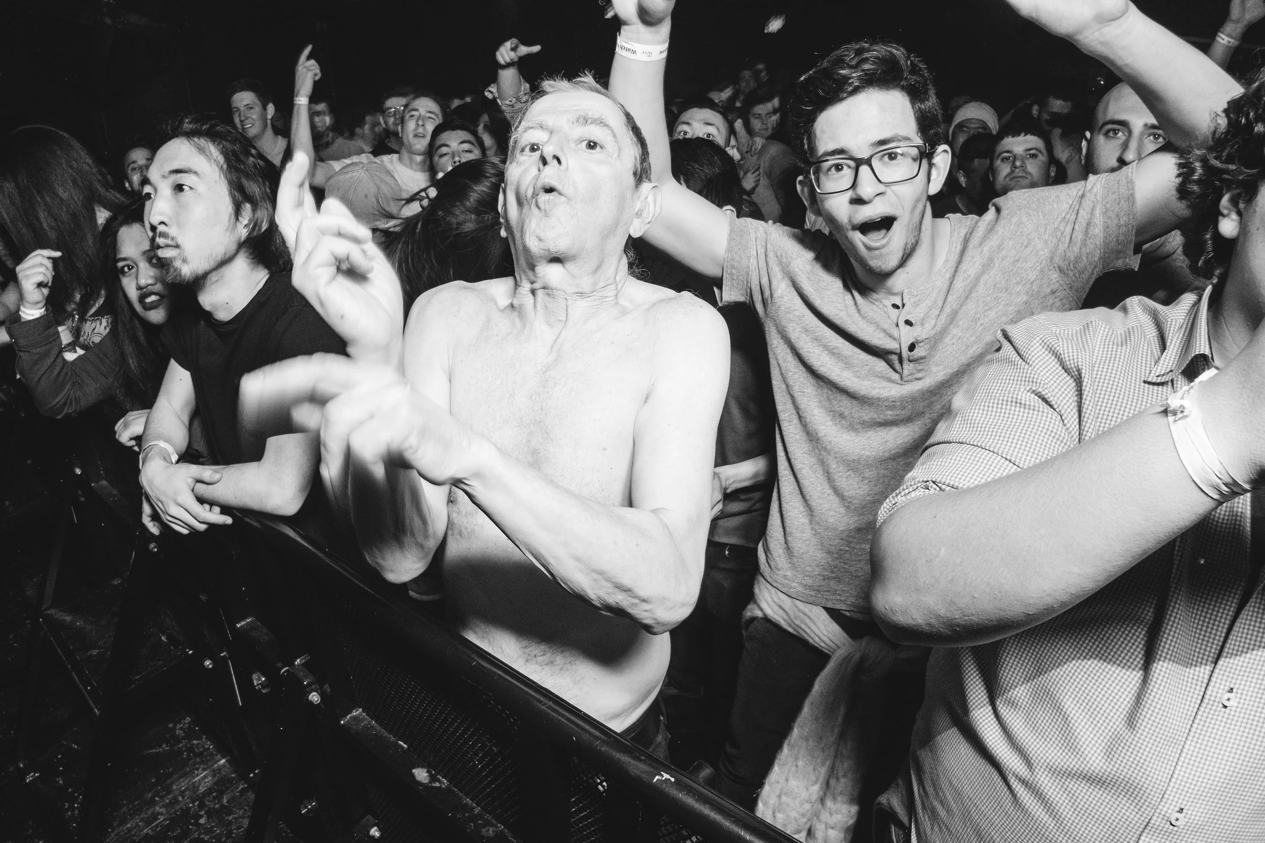 Older attendee dancing during drum and bass set in the Grand Ballroom at Webster Hall, New York City, 2016