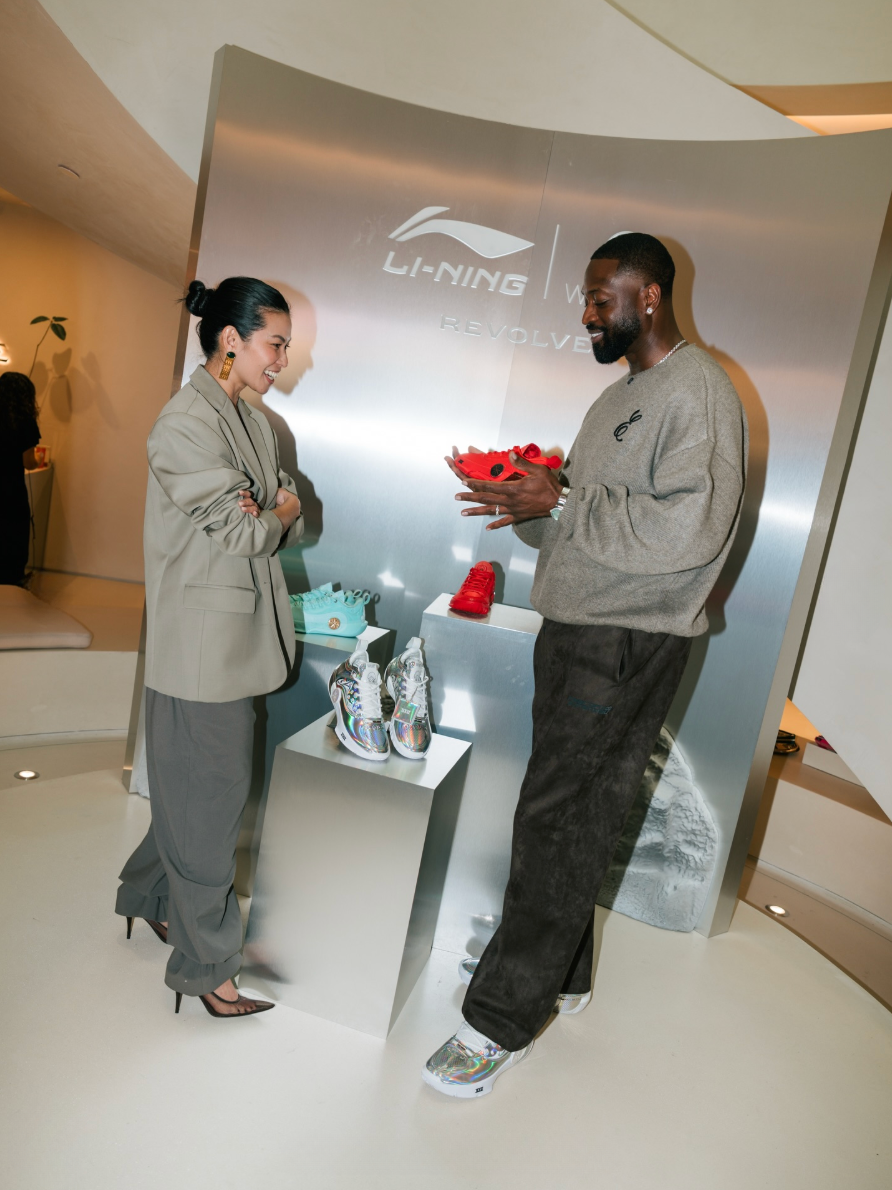 Raissa Gerona, Chief Brand Officer of REVOLVE, and Dwyane Wade, three-time NBA Champion, Olympic Gold medalist, and thirteen-time NBA All-Star.