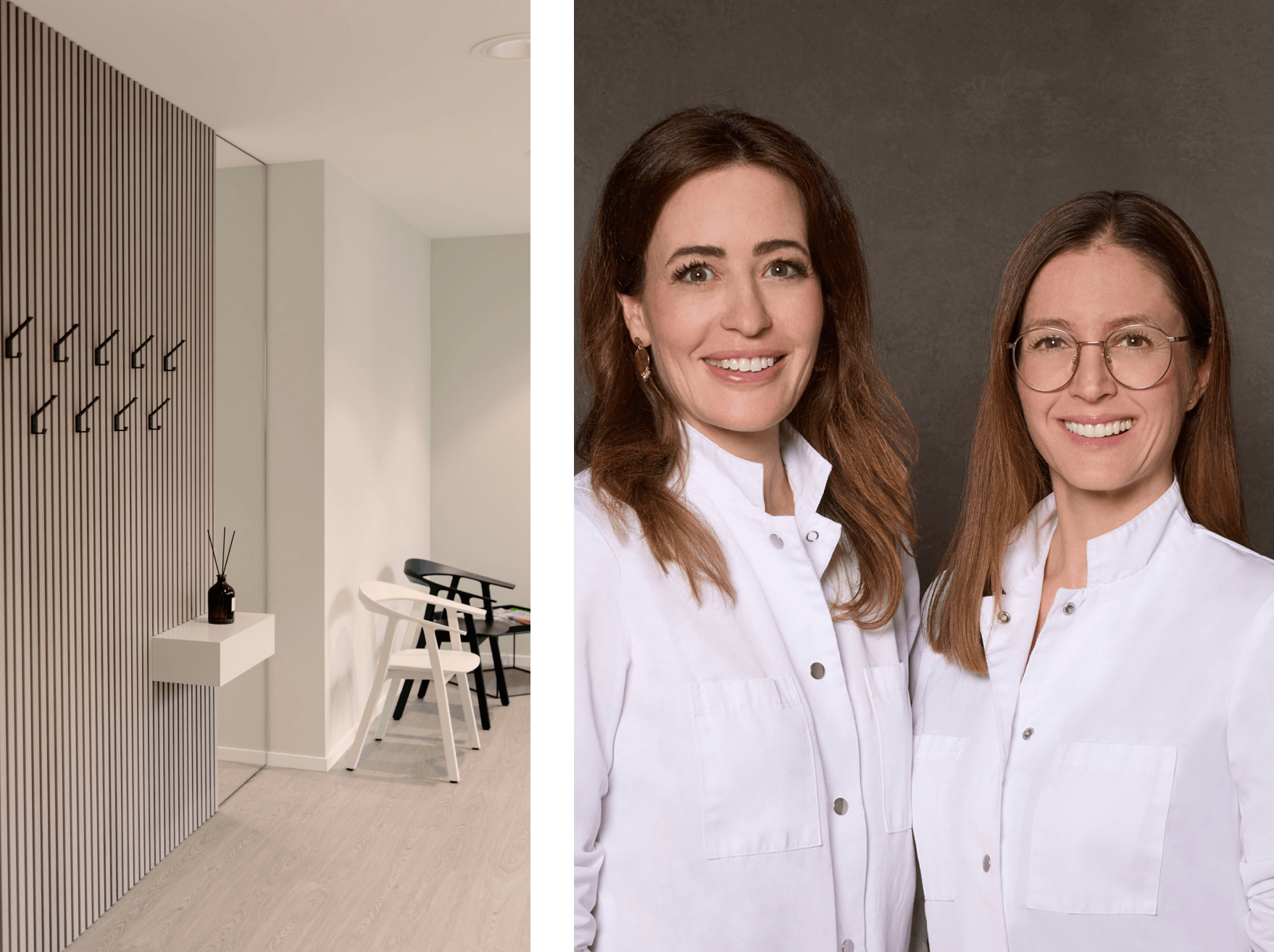 Interior of a modern minimalist room with a vertical wooden slat wall, a small white shelf with a black vase and reed diffuser, a white chair, a black chair, and a small table with some items. Two women in white lab coats smiling at the camera are positioned against a dark background.