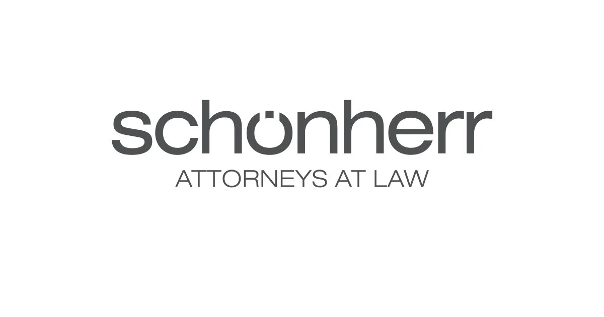 Logo for emocionar law firm with the text "schönherr" and underneath "ATTORNEYS AT LAW" on a white background.