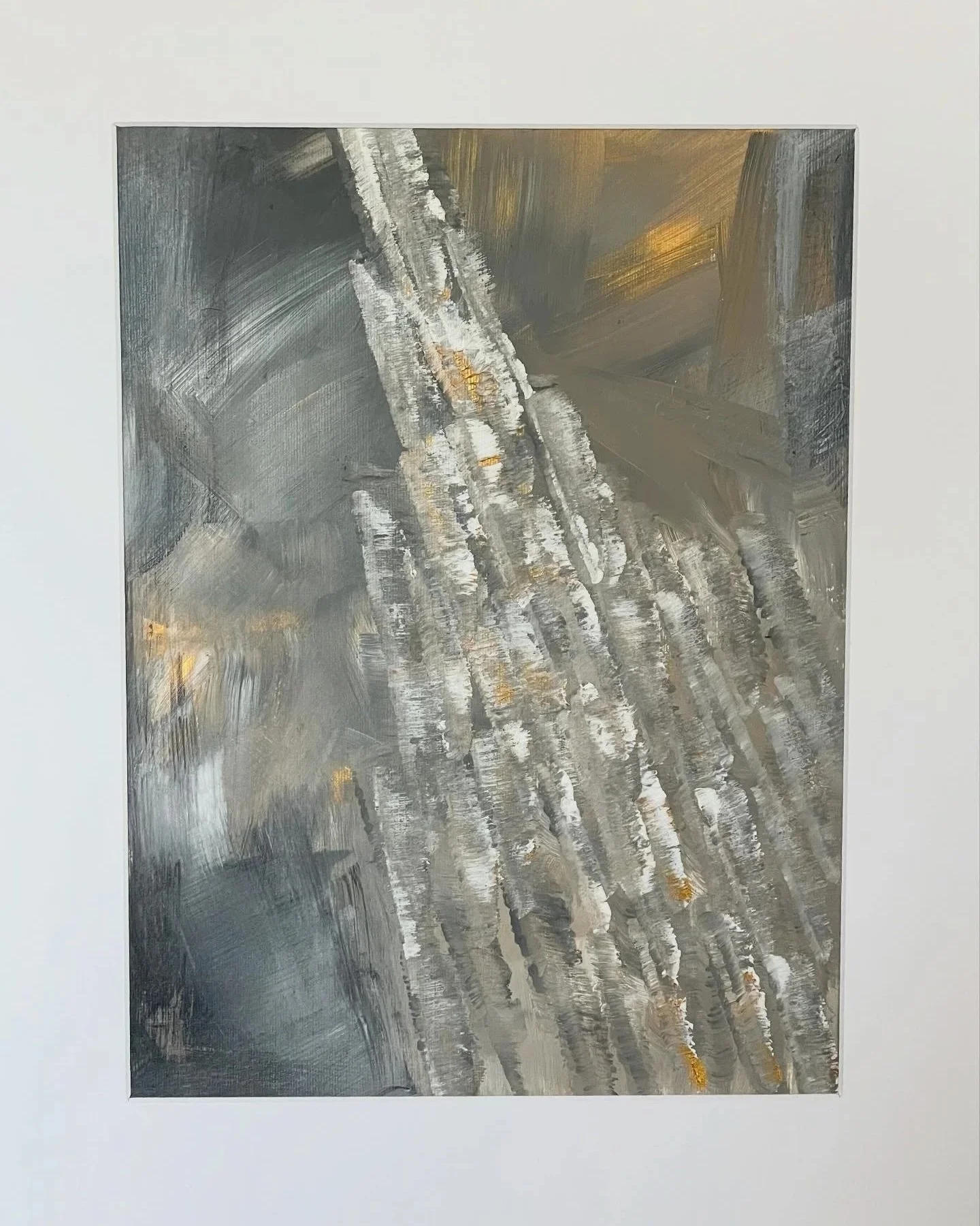 Close-up abstract painting with silver, gold, and dark gray brushstrokes.