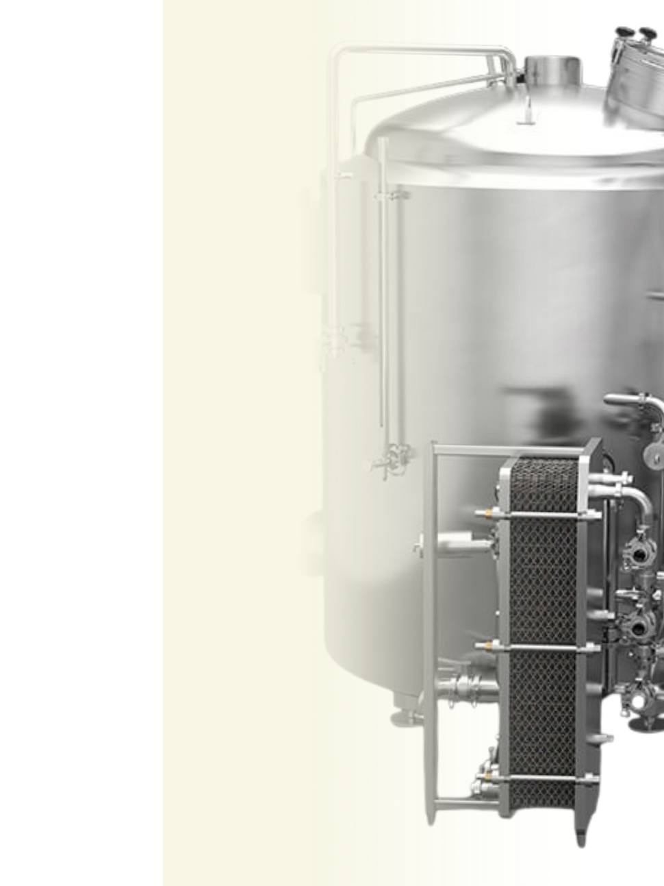 industrial stainless steel tank with pipes and heat exchanger in a clean, brightly lit facility.