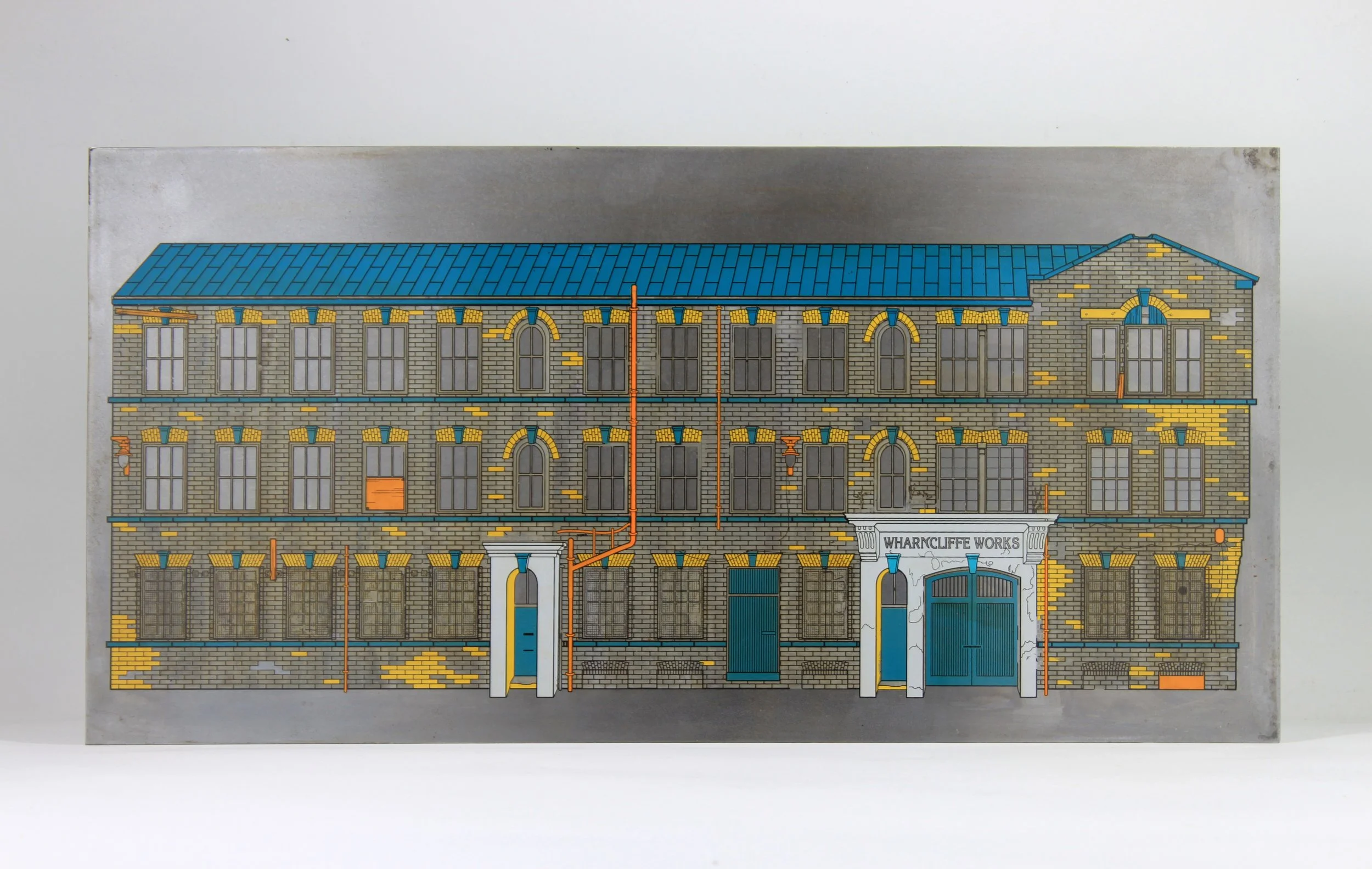 Illustration of a multi-story brick building labeled 'Wharcliffe Works' with blue, yellow, and orange architectural details.