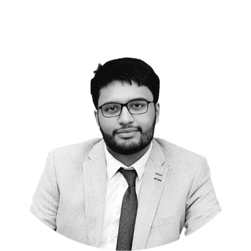 Black and white portrait of a man wearing glasses, a light-colored blazer, a shirt, and a tie, looking at the camera against a plain background.