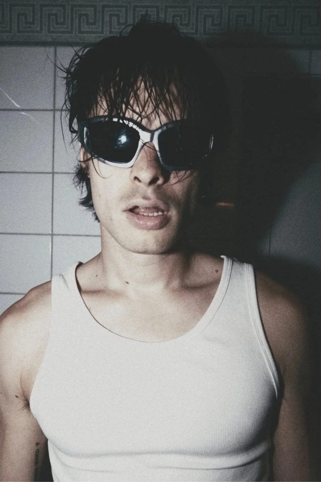 Picture of music artist Emil Lewis wearing sunglasses