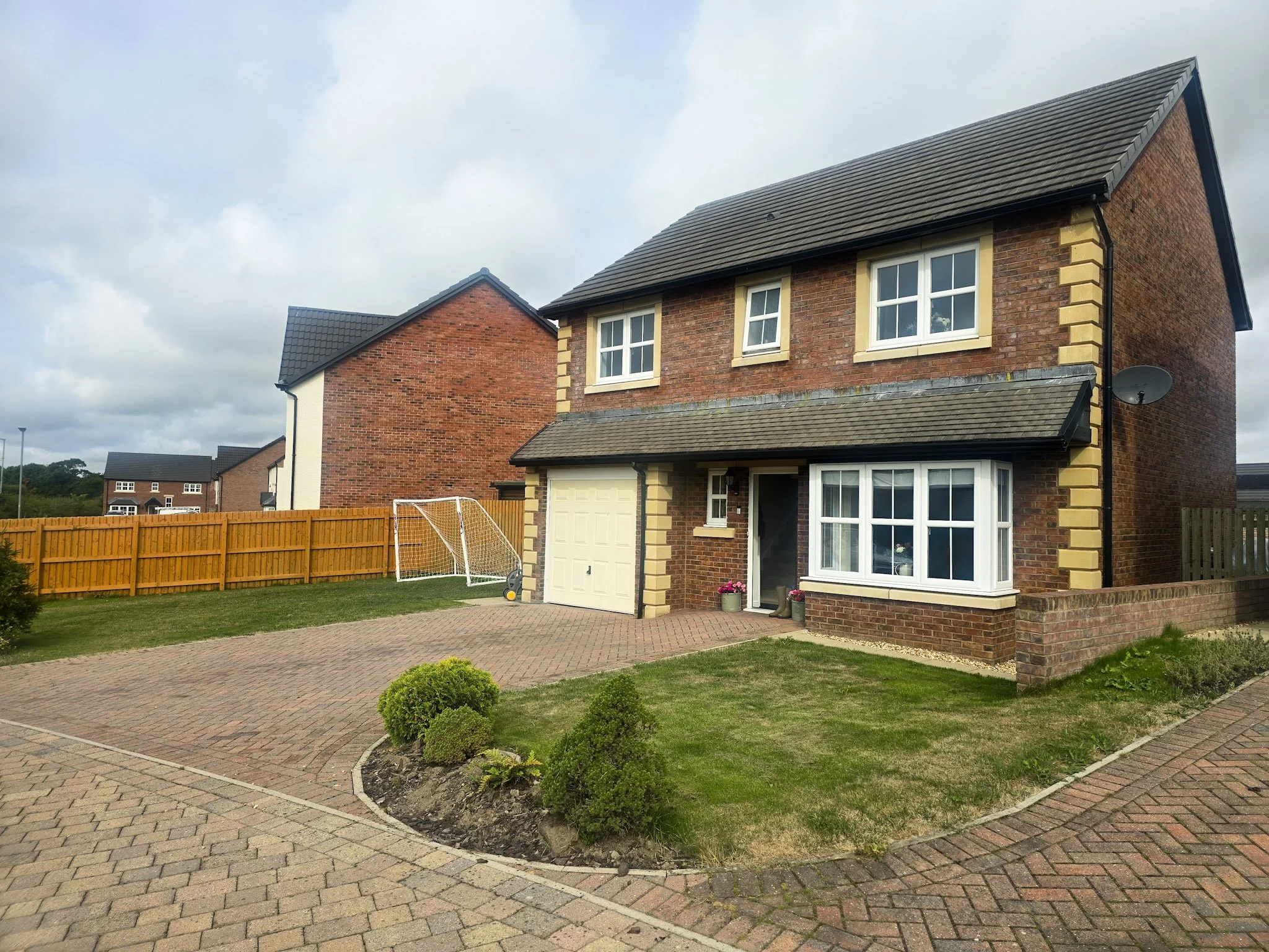  A Spacious Four-Bedroom Family Home

This attractive **four-bedroom detached home** offers approximately **1,238 sq ft of well-proportioned living space**, complemented by an **integral single garage**.

Designed with family life in mind, the ground