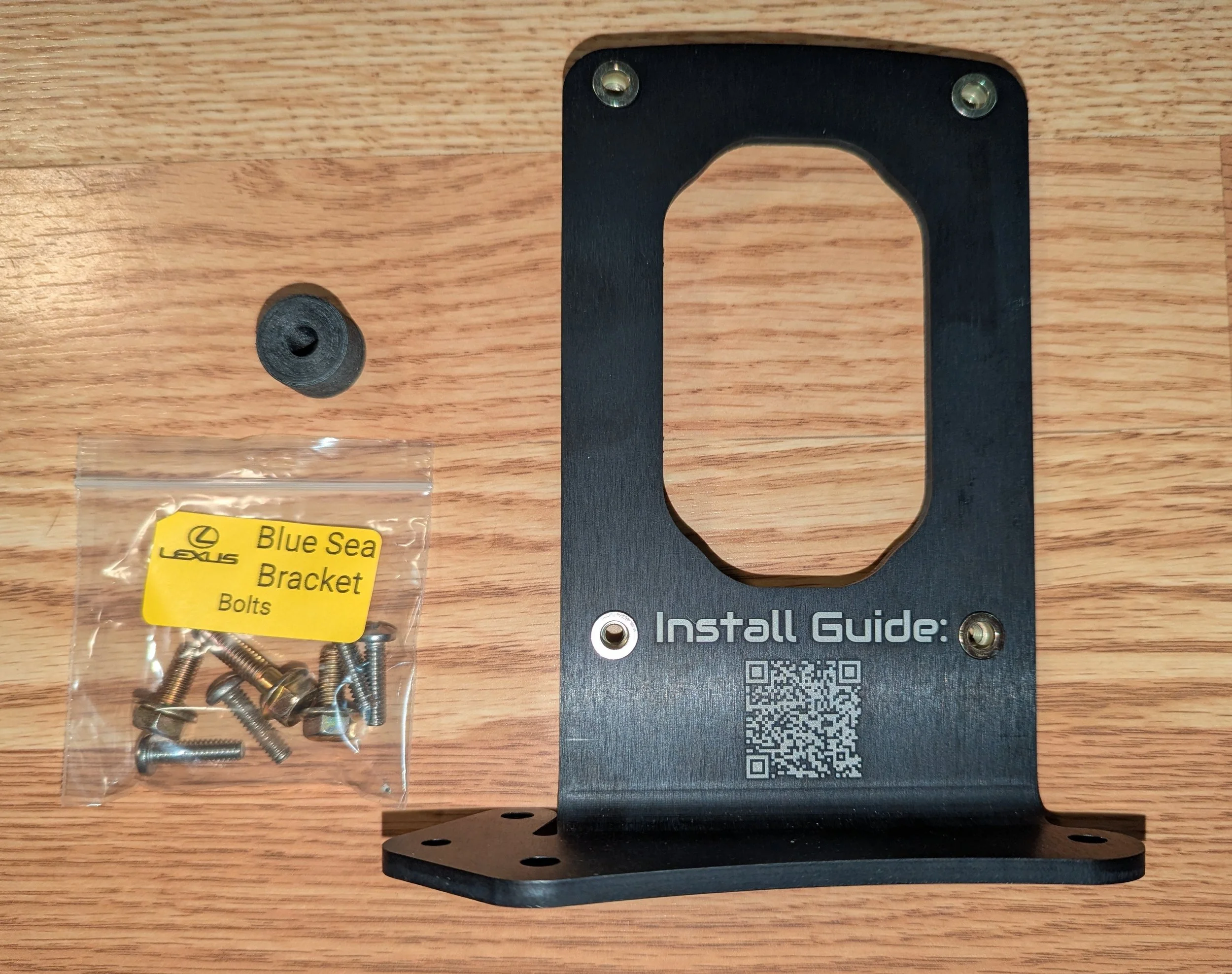 Blue Sea battery disconnect switch mounting bracket in a Lexus LX470