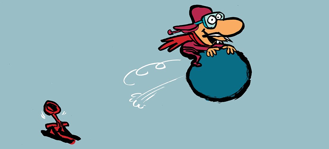 Cartoon witch wearing glasses and a red dress riding a large blue bomb with a lit fuse, flying through the air.