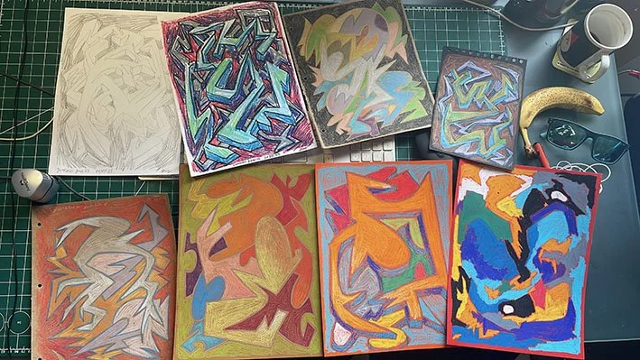 Caran D'ache crayons on tinted paper.