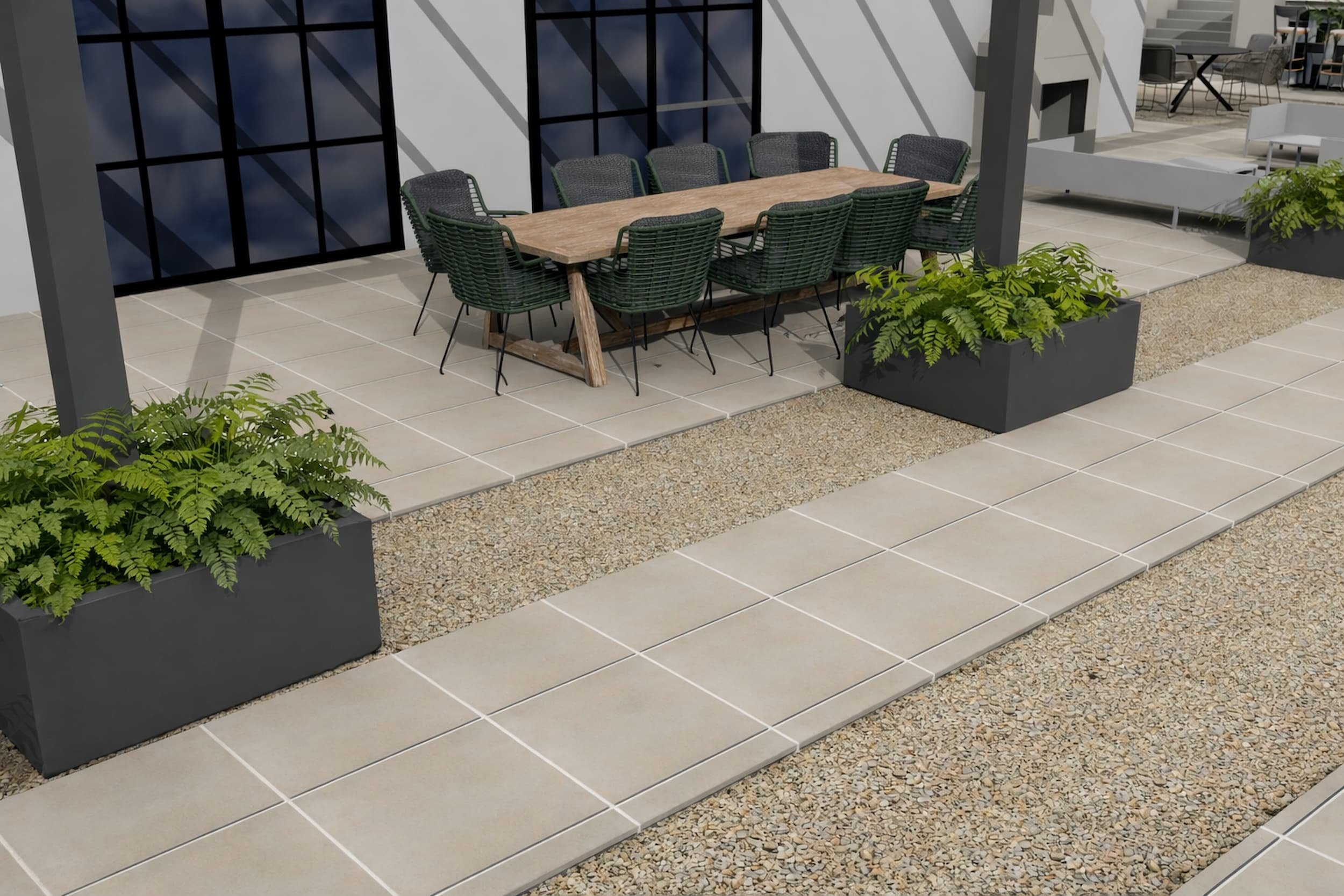 Modern garden dining area with pergola, large outdoor table, porcelain paving, gravel pathways and contemporary planters, designed for relaxed entertaining and everyday use.