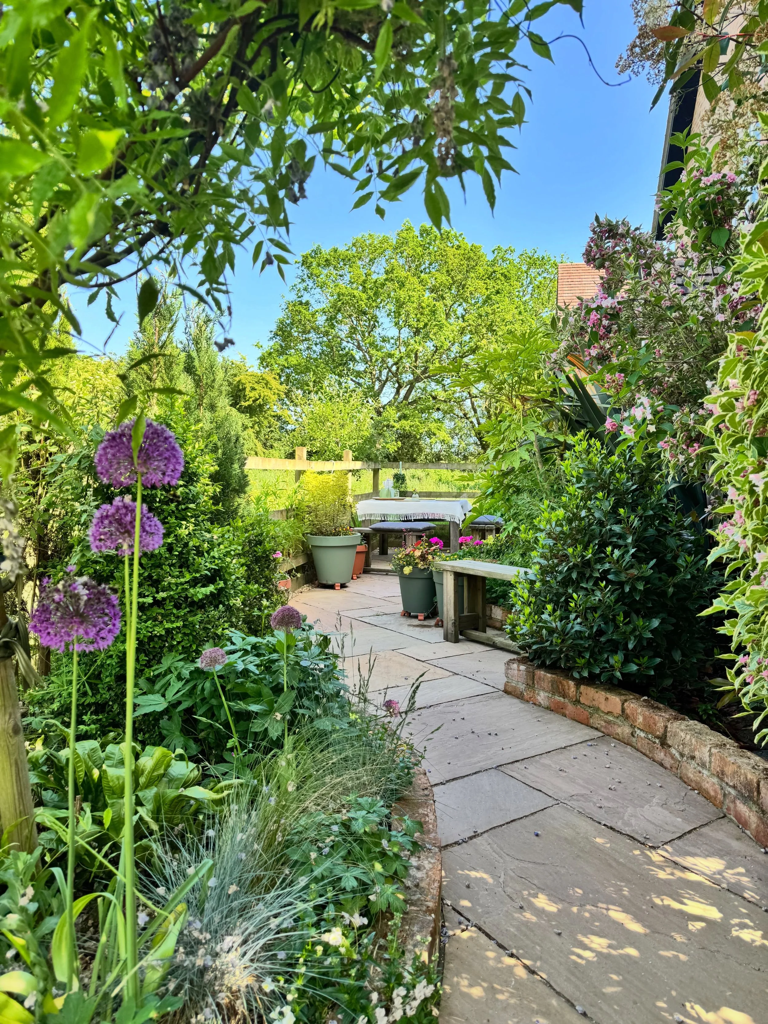 A garden that feels settled, layered and lived in.