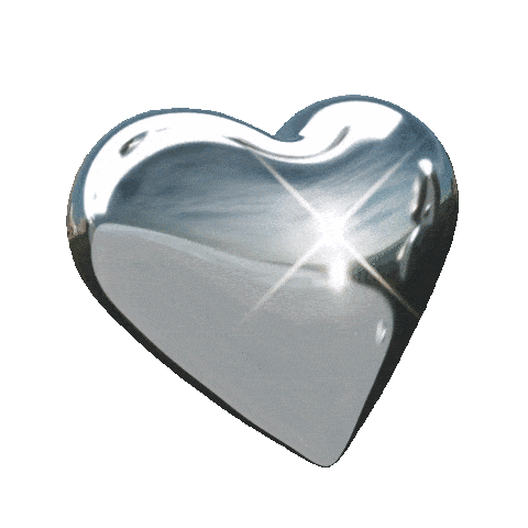 A shiny silver heart-shaped object reflecting light.