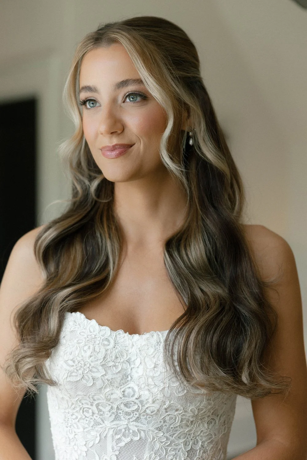 Bridal portrait featuring soft Hollywood waves and glowing skin by Carly Marie