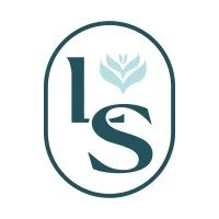 Logo with a stylized leaf above the stylized letters 'L' and 'S' inside an oval outline.
