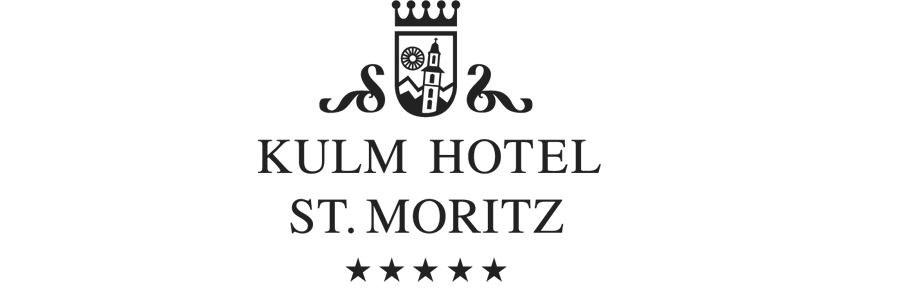 Hotel sign for Kulm Hotel St. Moritz with a crest and four stars.