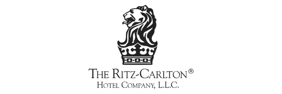 Logo of The Ritz-Carlton Hotel Company, L.L.C. featuring a lion's head within a crown.