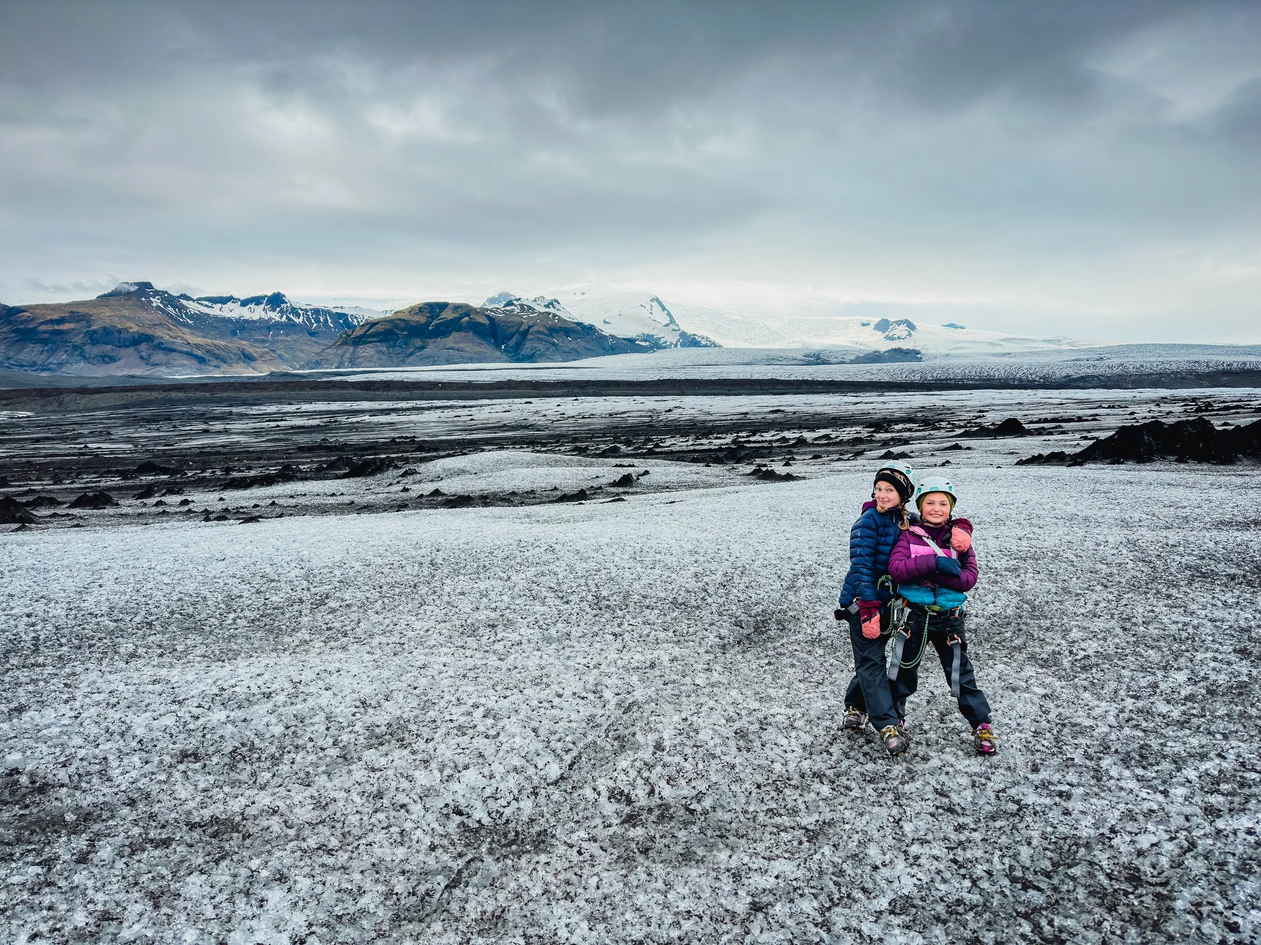 Two girls hiking on a glacier in Iceland