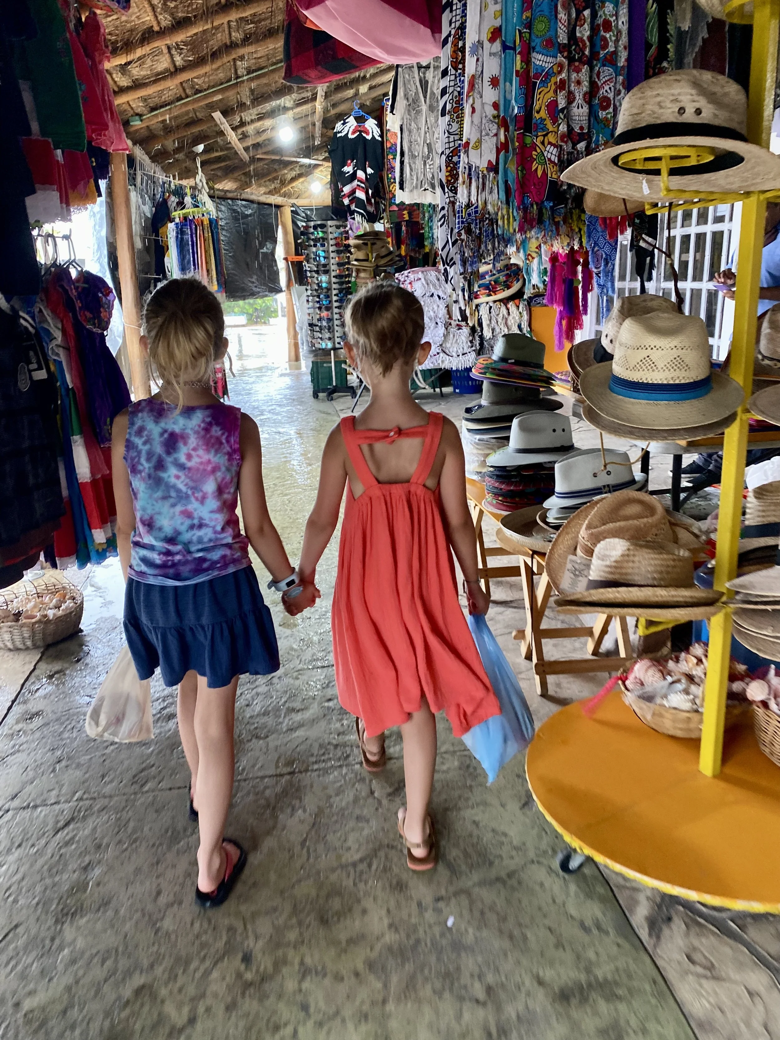 Walking through the market in Puerto Morelos, Mexico