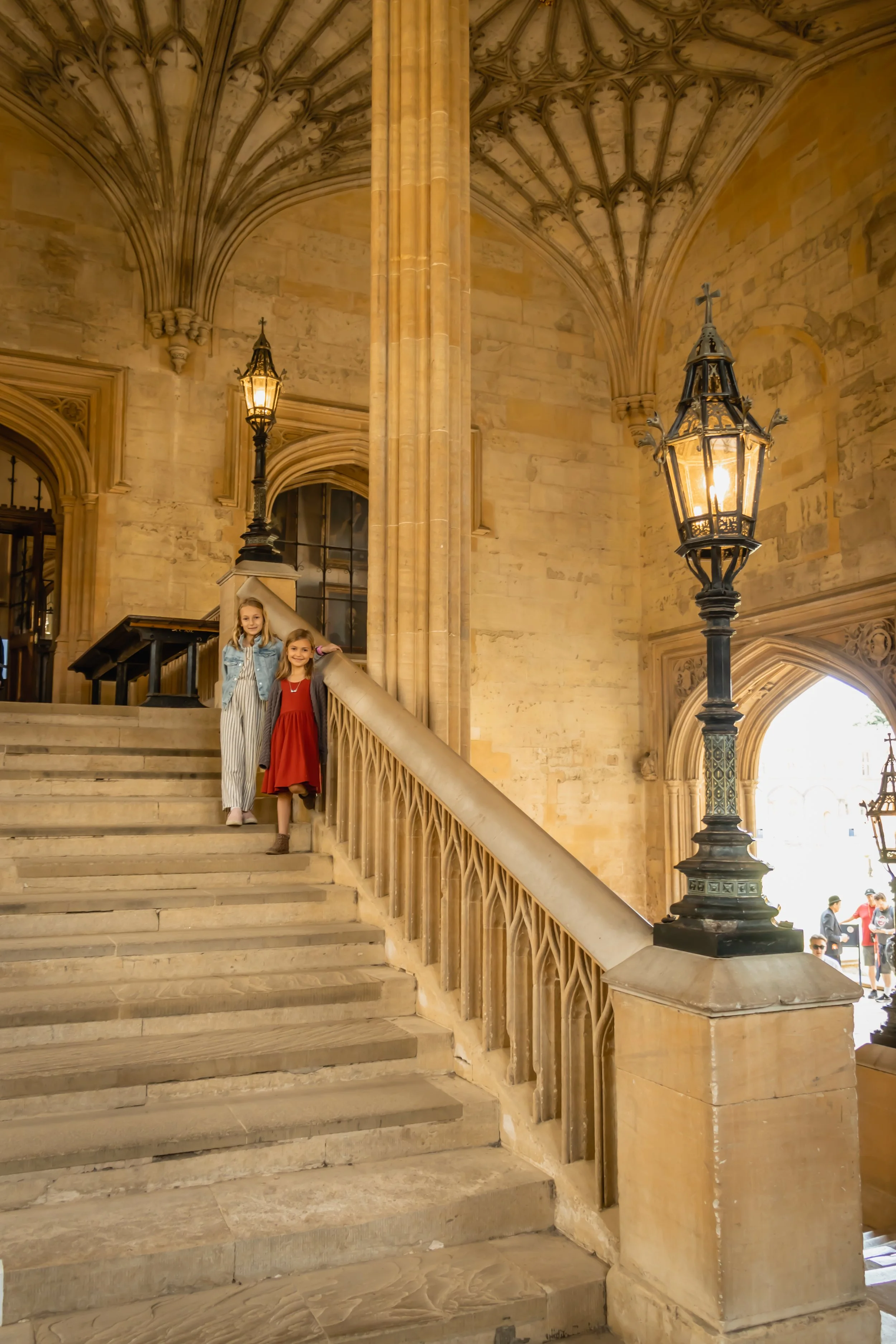 Standing in the stairs at Oxford University, a Harry Potter filming sites and inspiration