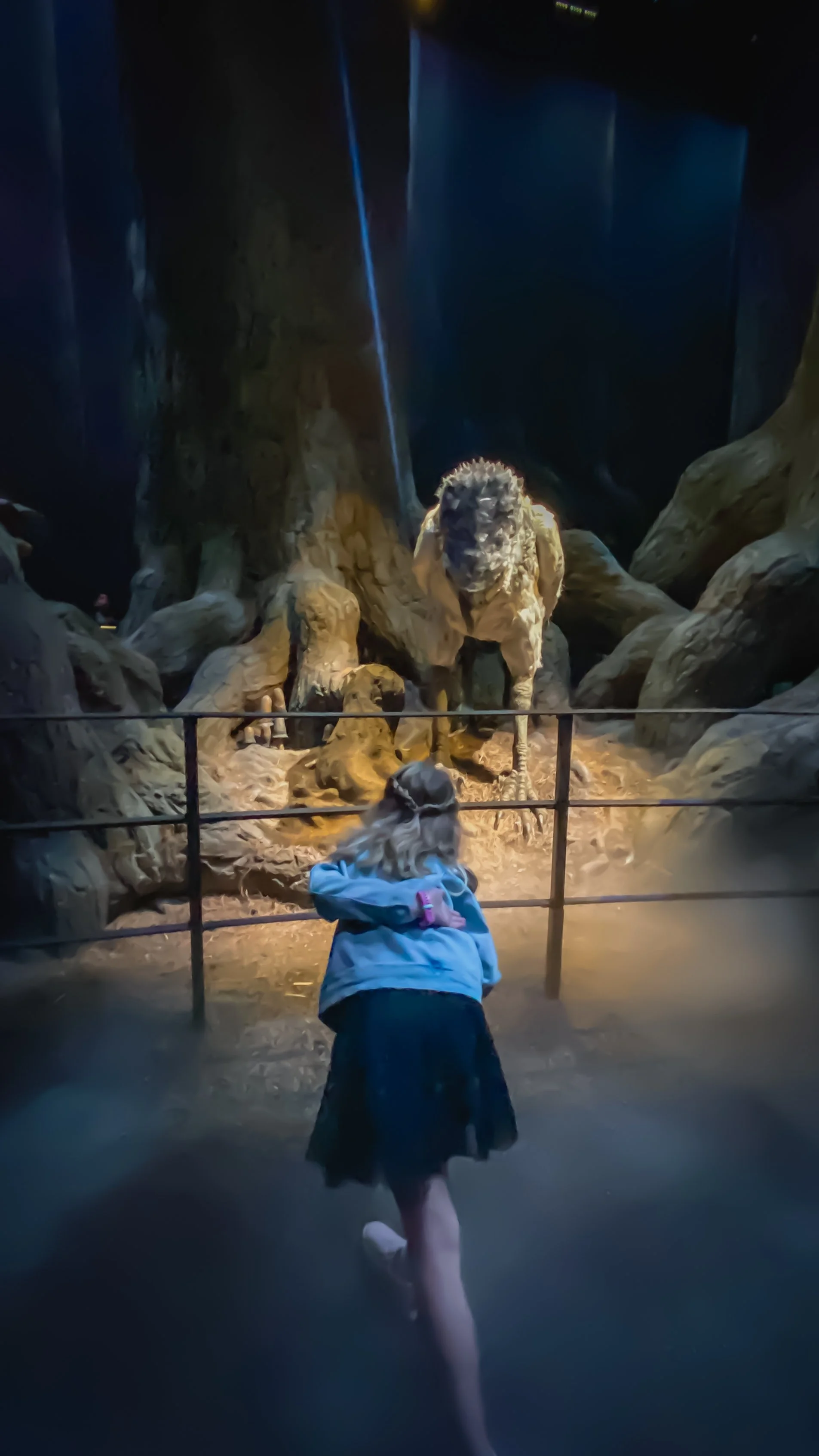 A girl bowing to a Hippogriff at the Warner Brothers Studio, The Making of Harry Potter