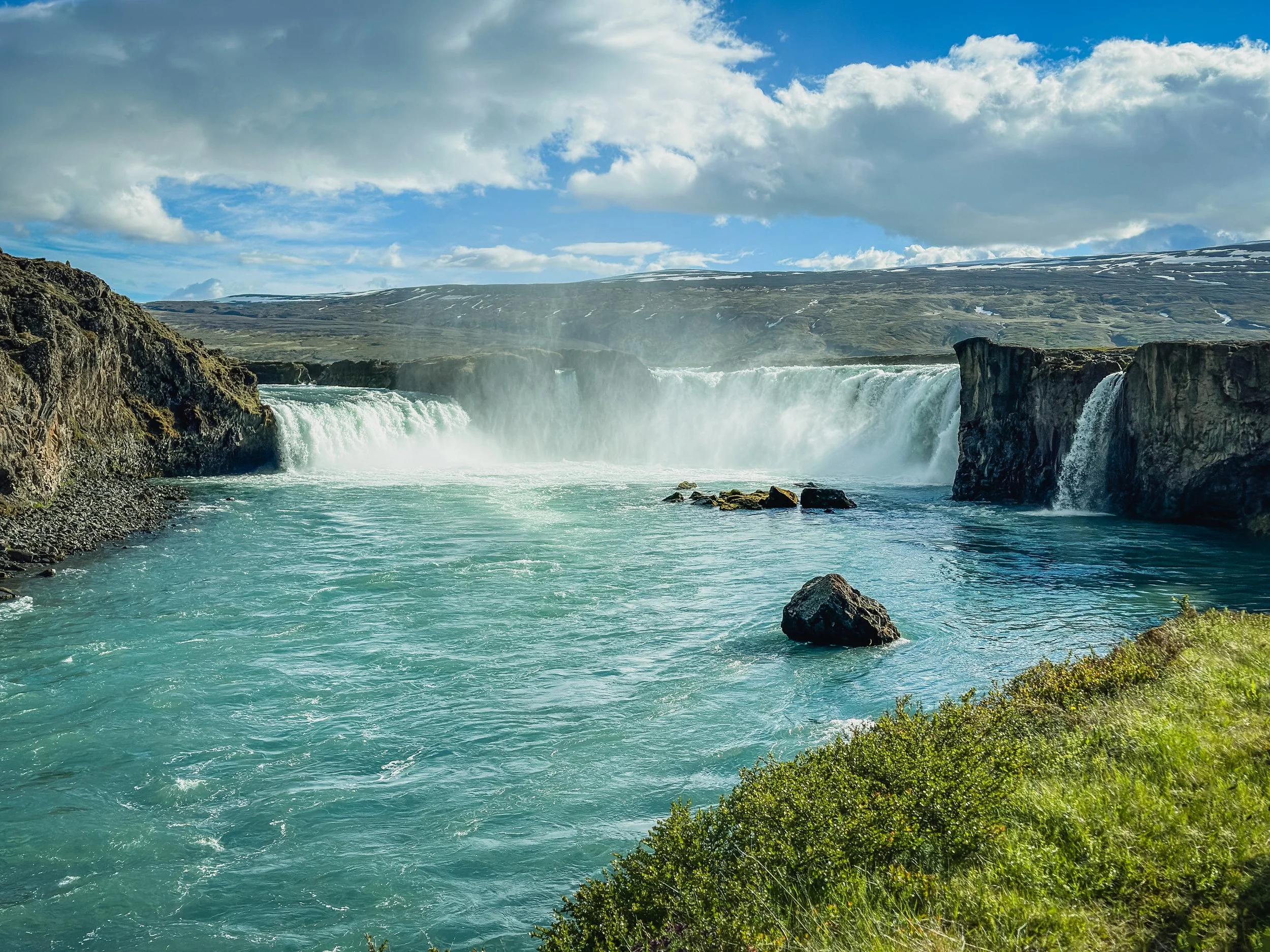 Enjoying Goðafoss waterfall in Iceland