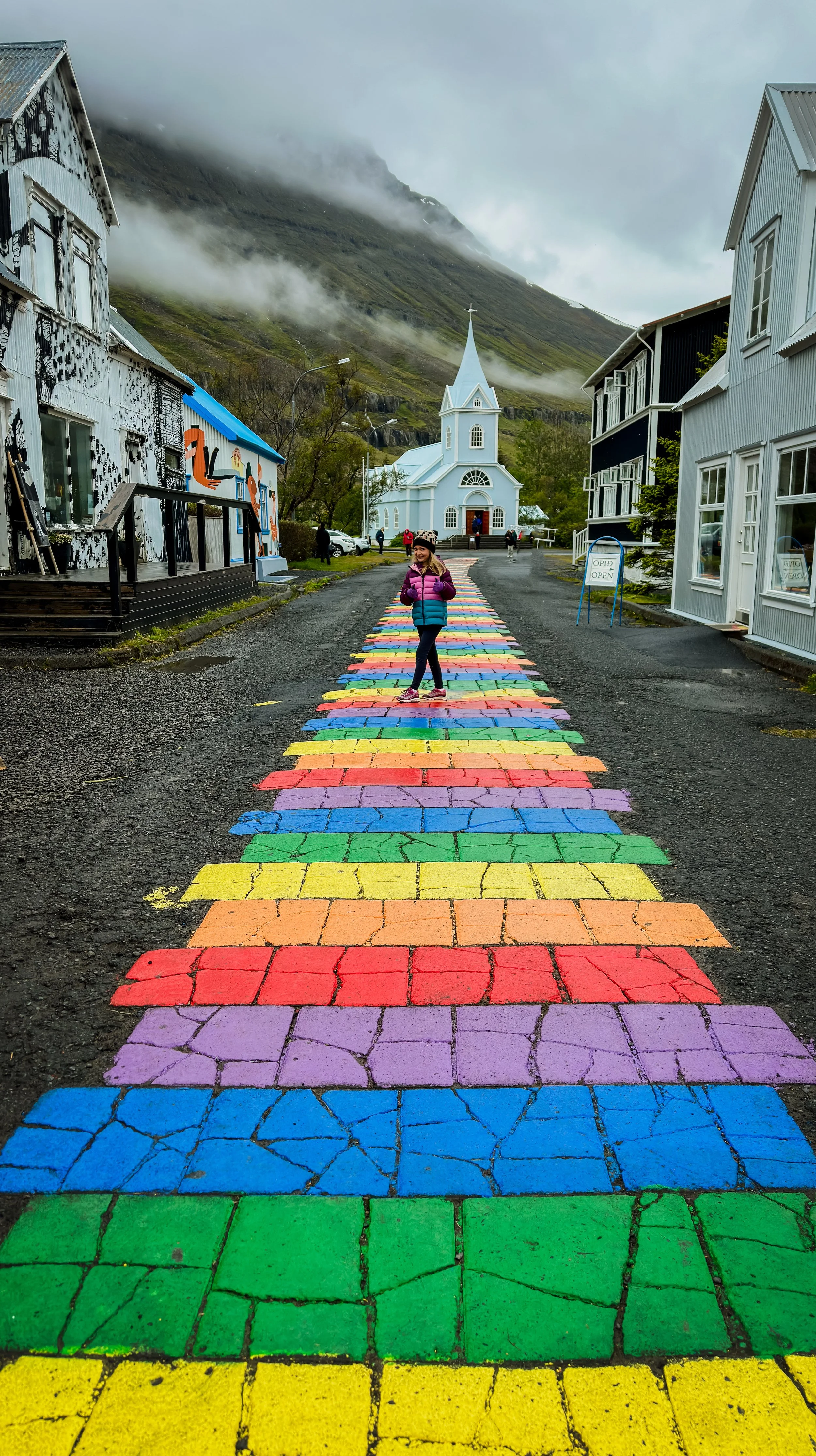 On the rainbow road in Seyðisfjörður, Iceland