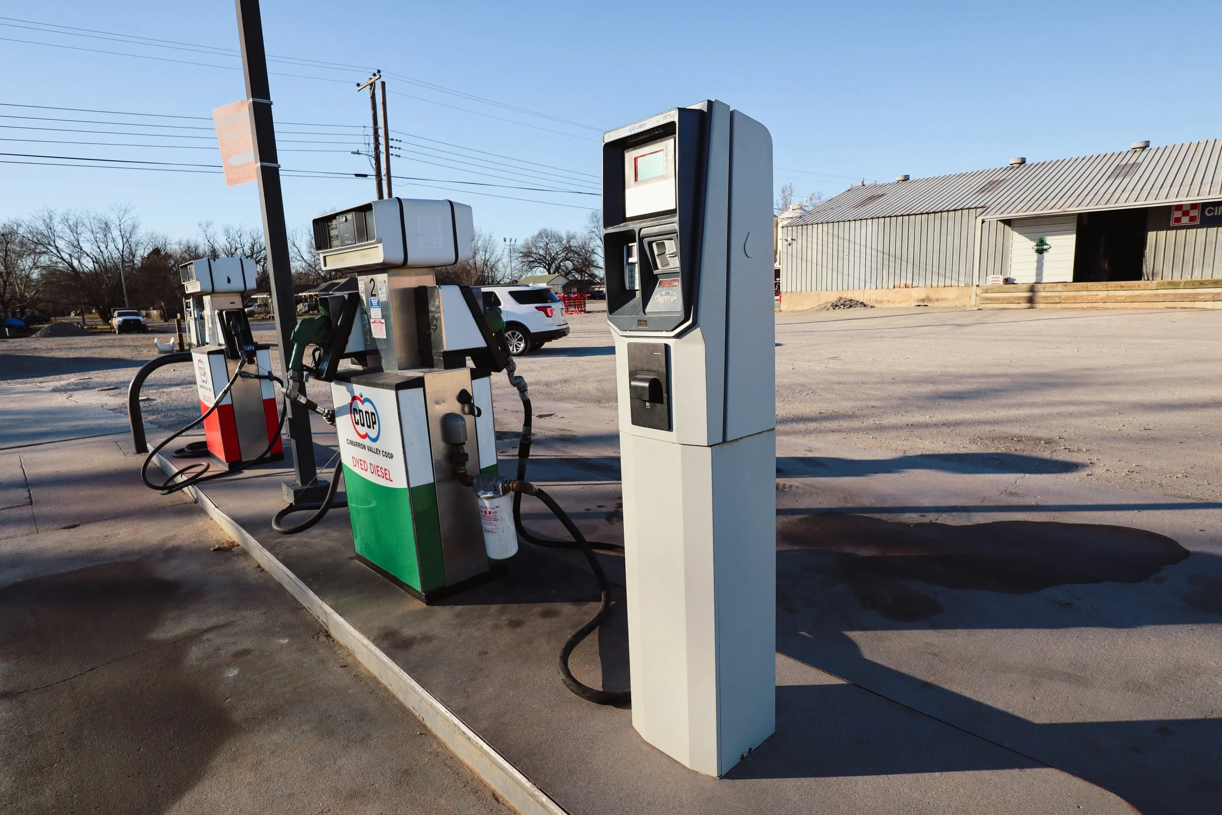 Fuel pumps and services at Cimarron Valley Co-op in Perkins, Oklahoma offering gasoline and diesel for farm, business, and personal use.