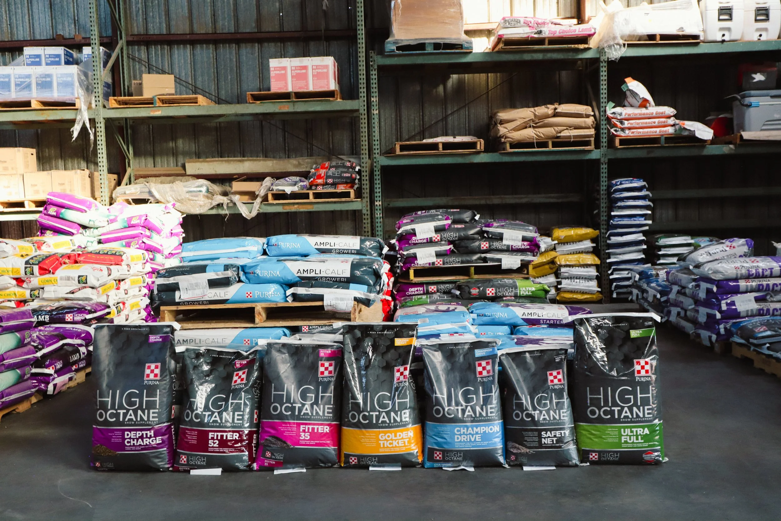 Show livestock feed and supplements in bags designed to support weight gain, muscle, and overall condition.
