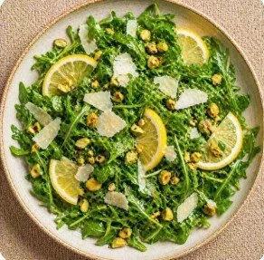 Arugula with lemon, shaved parmesan and pistachio.jpg