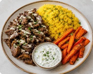 Beef Shawarma Plate Served w/ Turmeric Rice, Roasted Carrots & Tzatziki Sauce