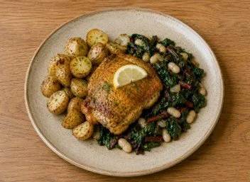 Lemon herb chicken with sauteed Swiss Chard and tosdyrf baby potatoes.jpg
