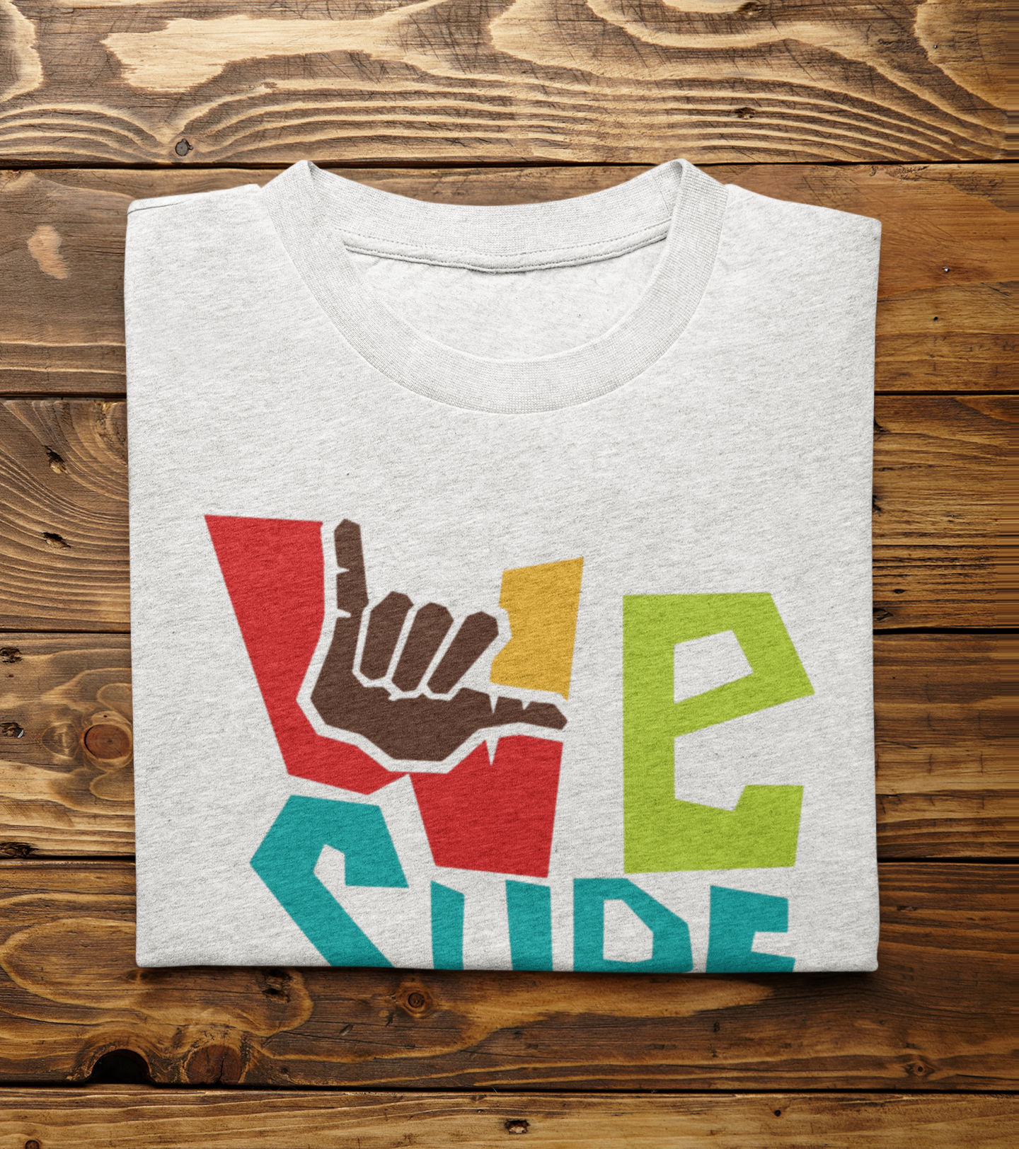 mockup-of-a-folded-heather-t-shirt-on-a-wooden-surface-m5686-r-el2 (1).png