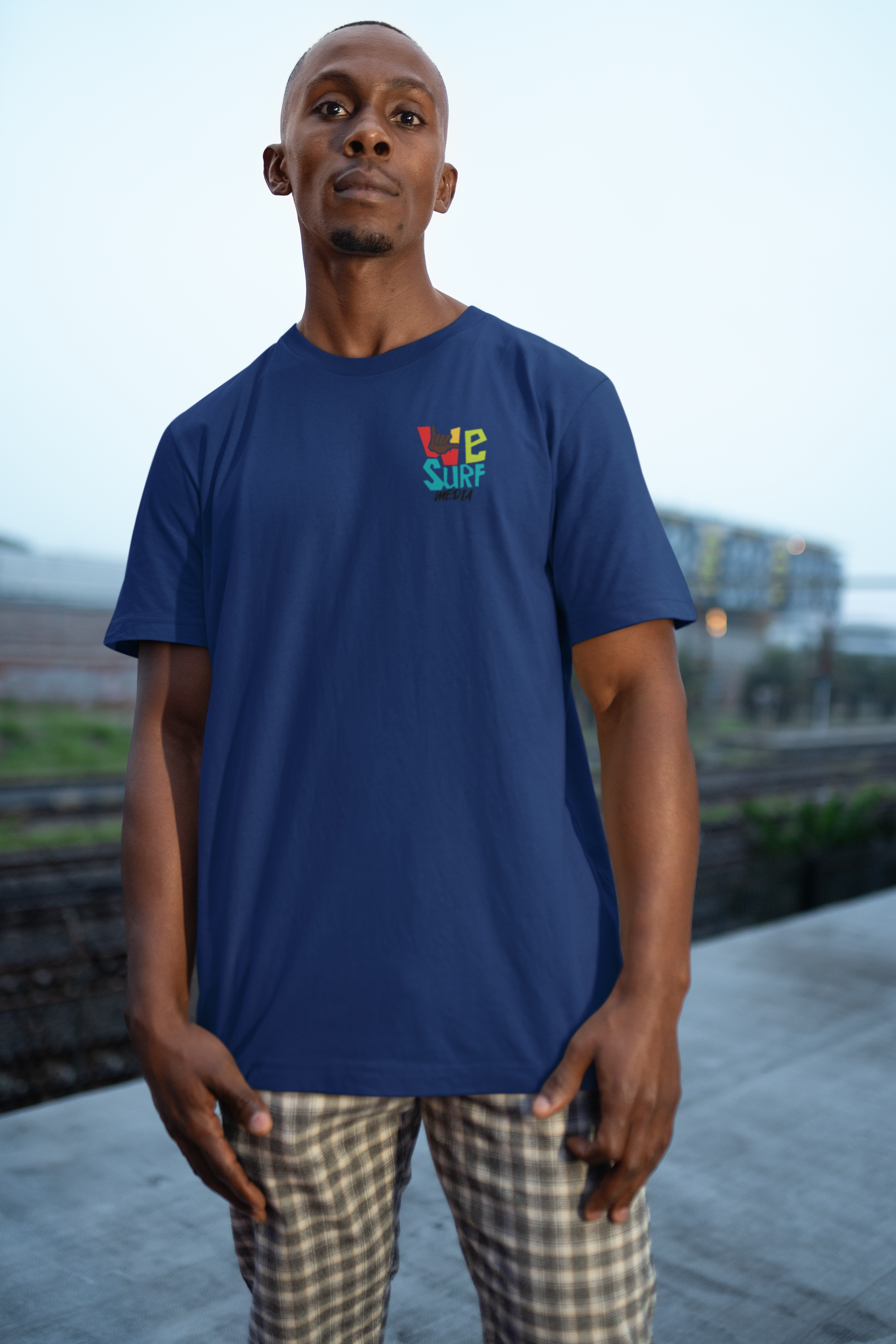 WE SURF LEFT LOGO TEE