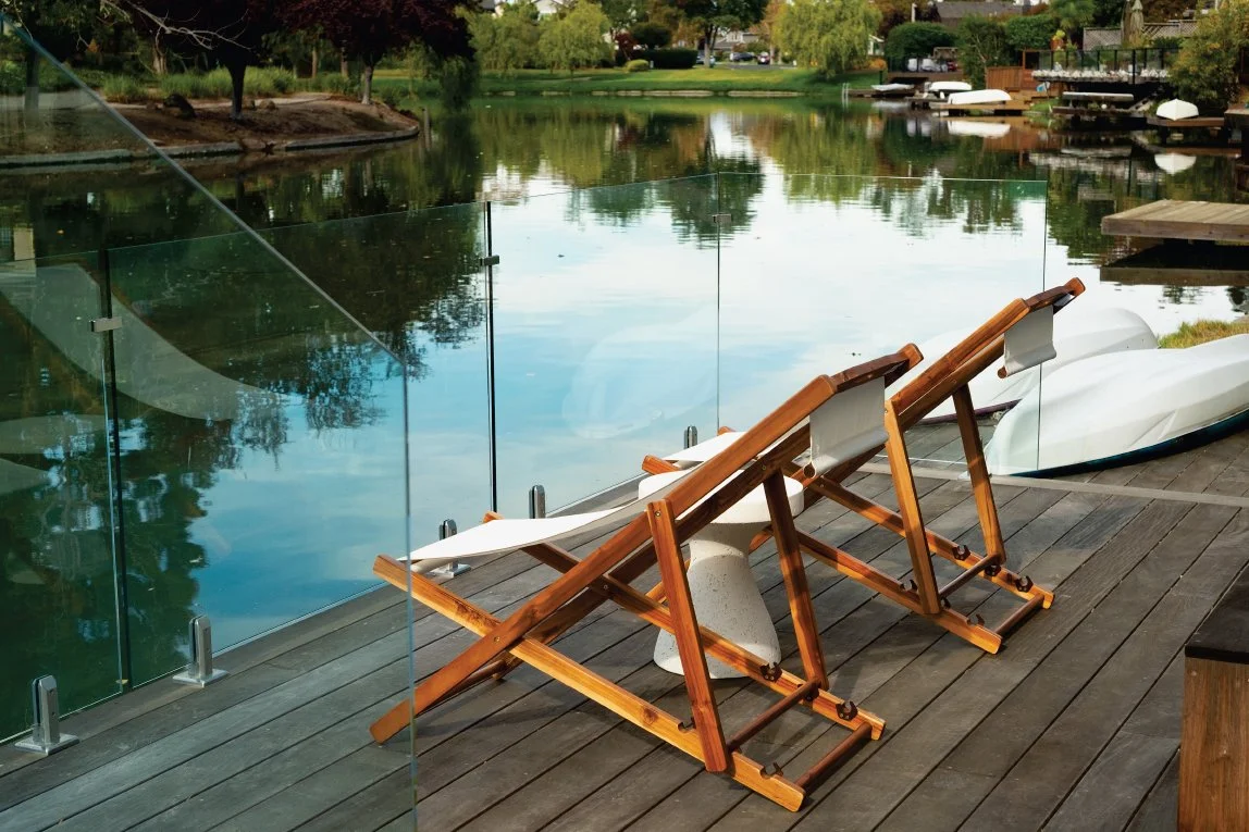 Alameda dock with custom glass railing.