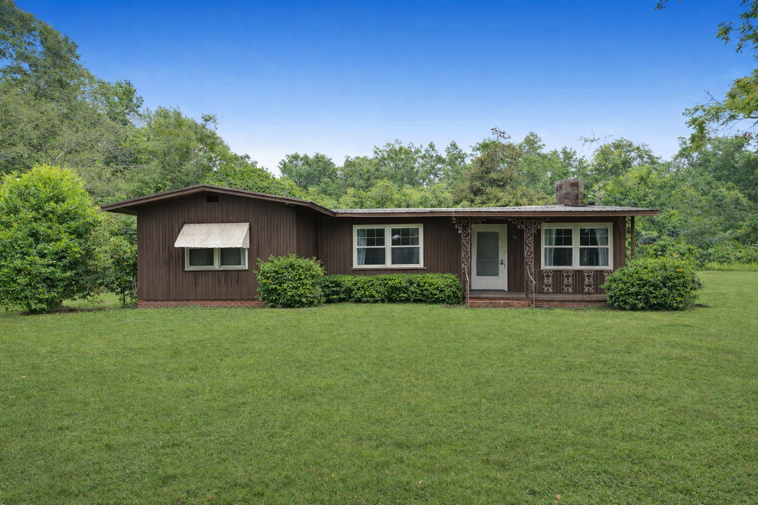 Rental college with shrubbery trimeed.png