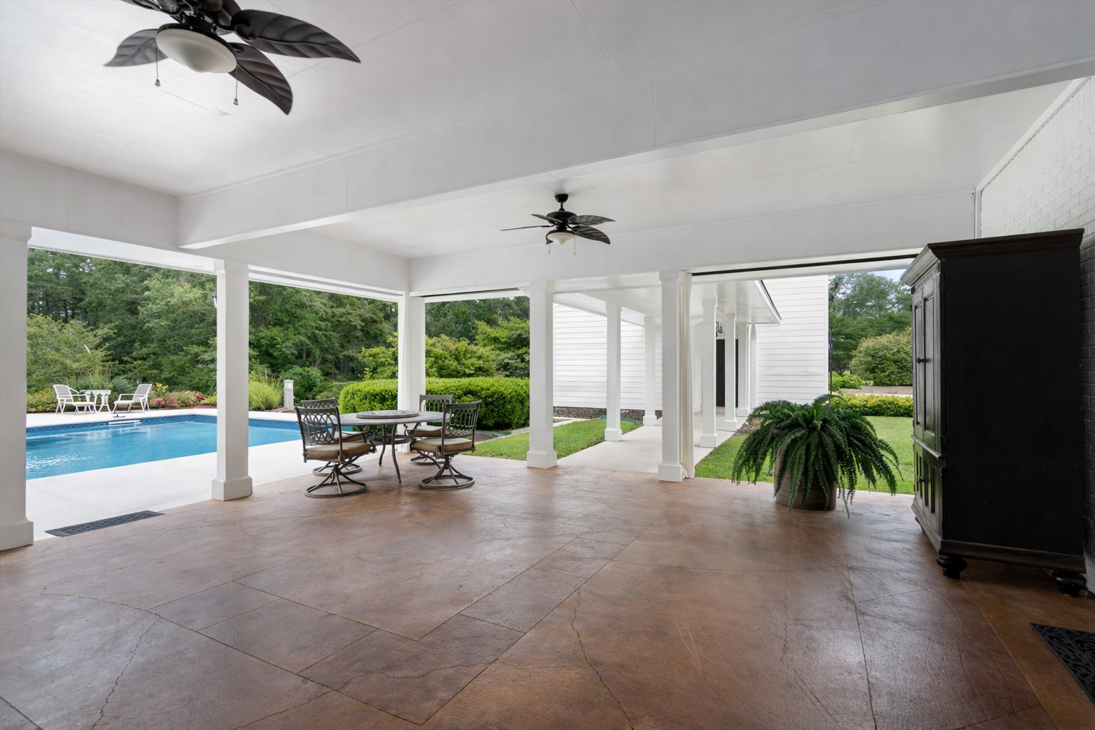 Serene patio with pool view (1).png