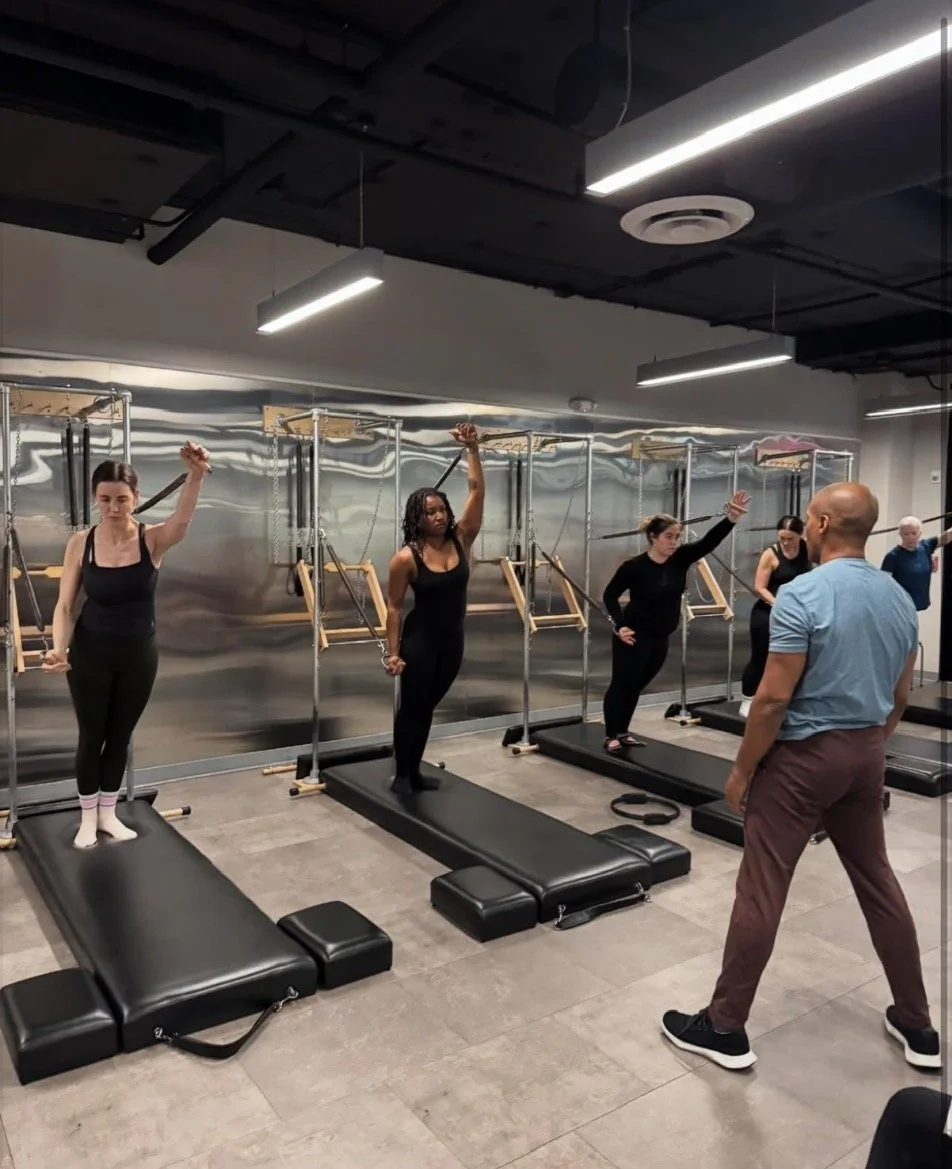 Adama Grace with Chris Robinson in a workshop at the Pilates Loft Columbia Pike, March 2025
