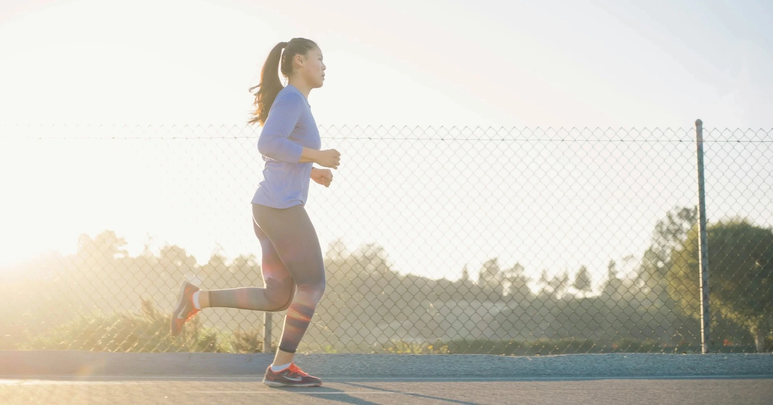woman outside running