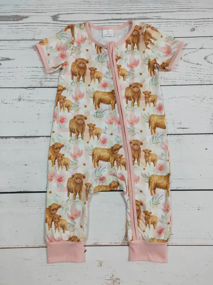 Cow Printed Baby Girl Zip Romper.webp