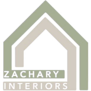 Logo for Zachary Interiors with a house-shaped design in shades of beige and green, featuring the company name.