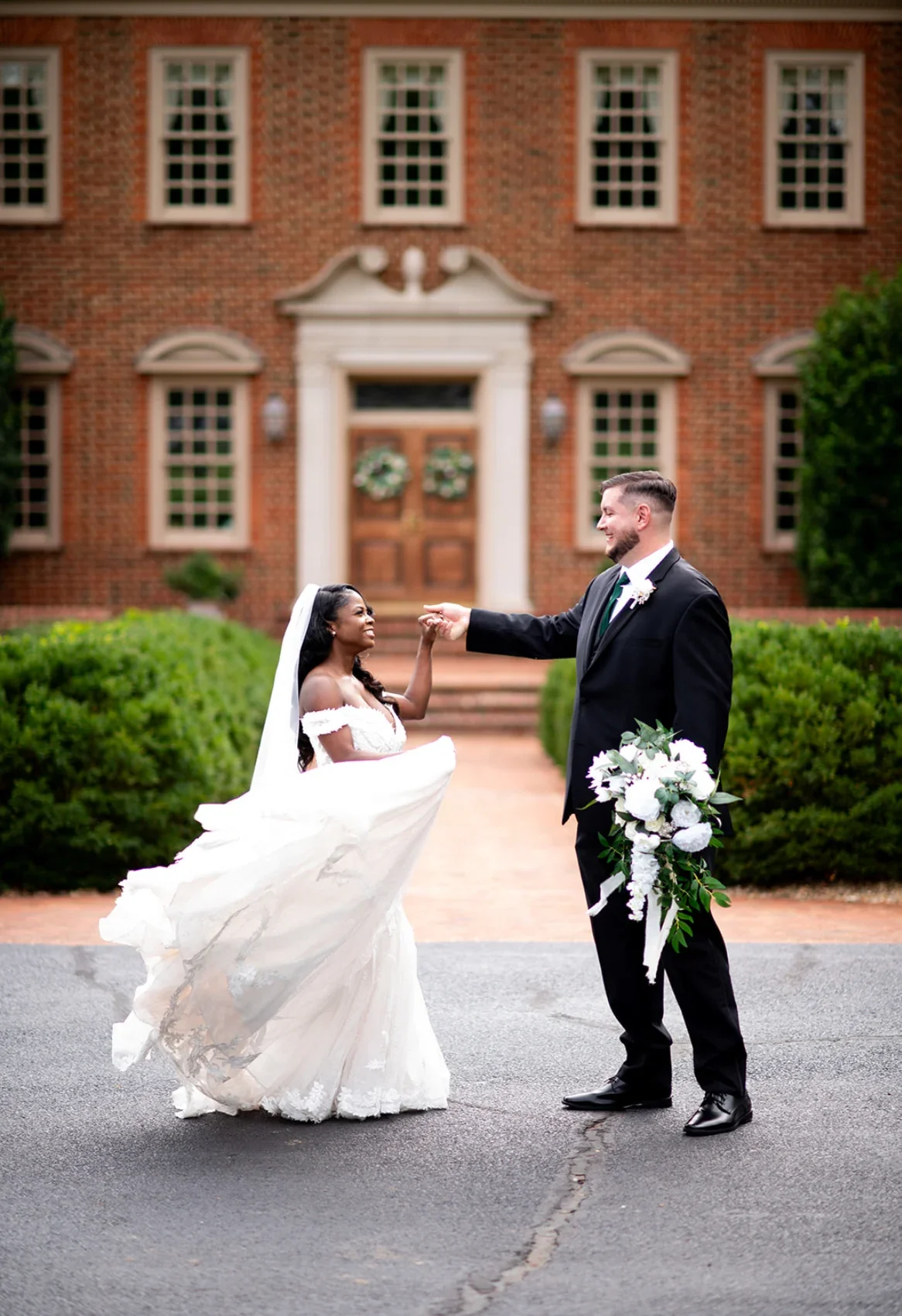 happy wedding couple dancing on wedding day.webp