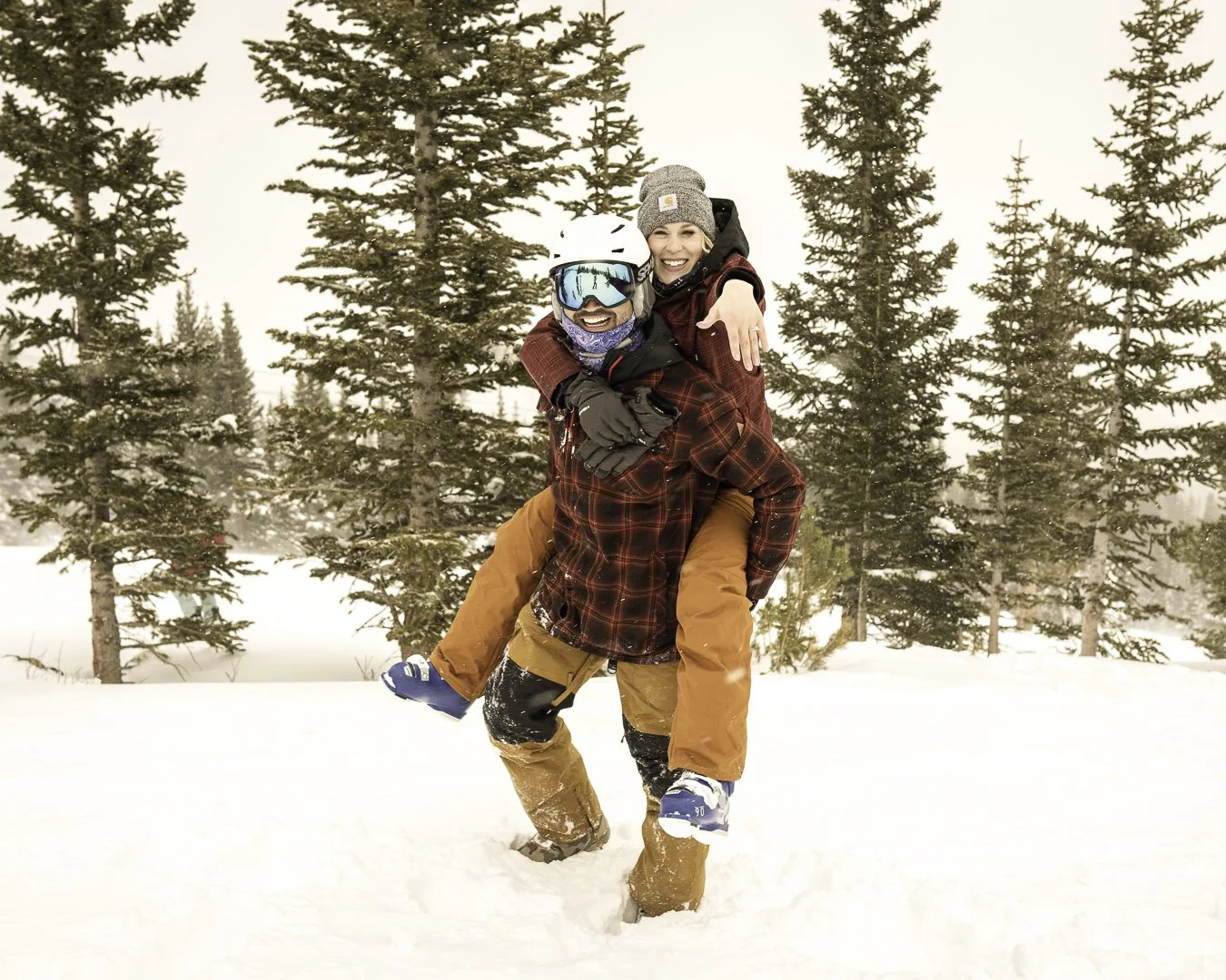 just-engaged-while-skiing-fun-showing-off-ring.jpg